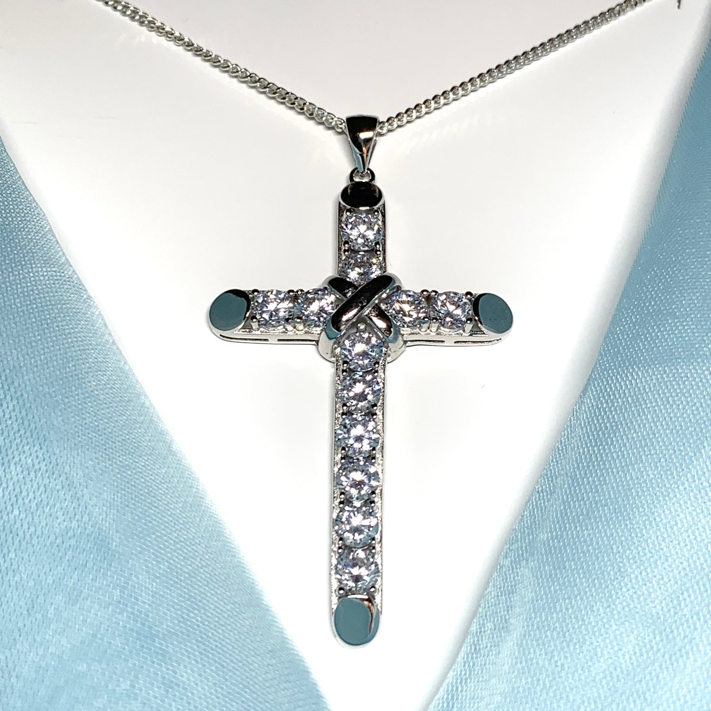 Large cubic zirconia set fancy sterling silver cross