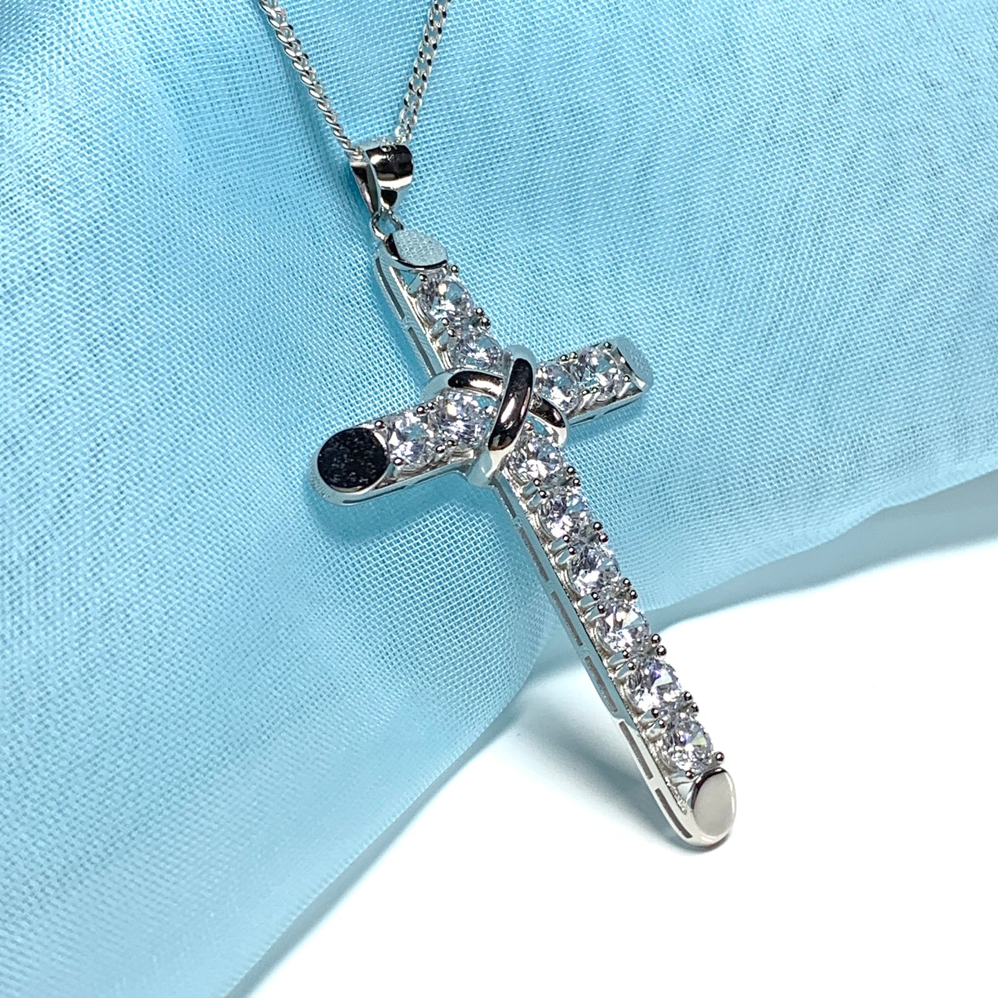 Large cubic zirconia set fancy sterling silver cross