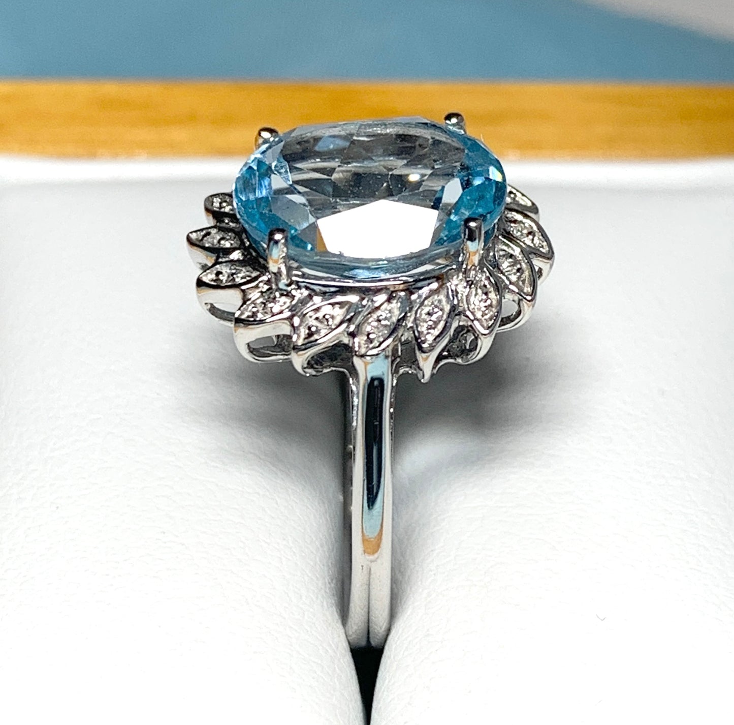 Large oval blue topaz and diamond sterling silver cluster ring