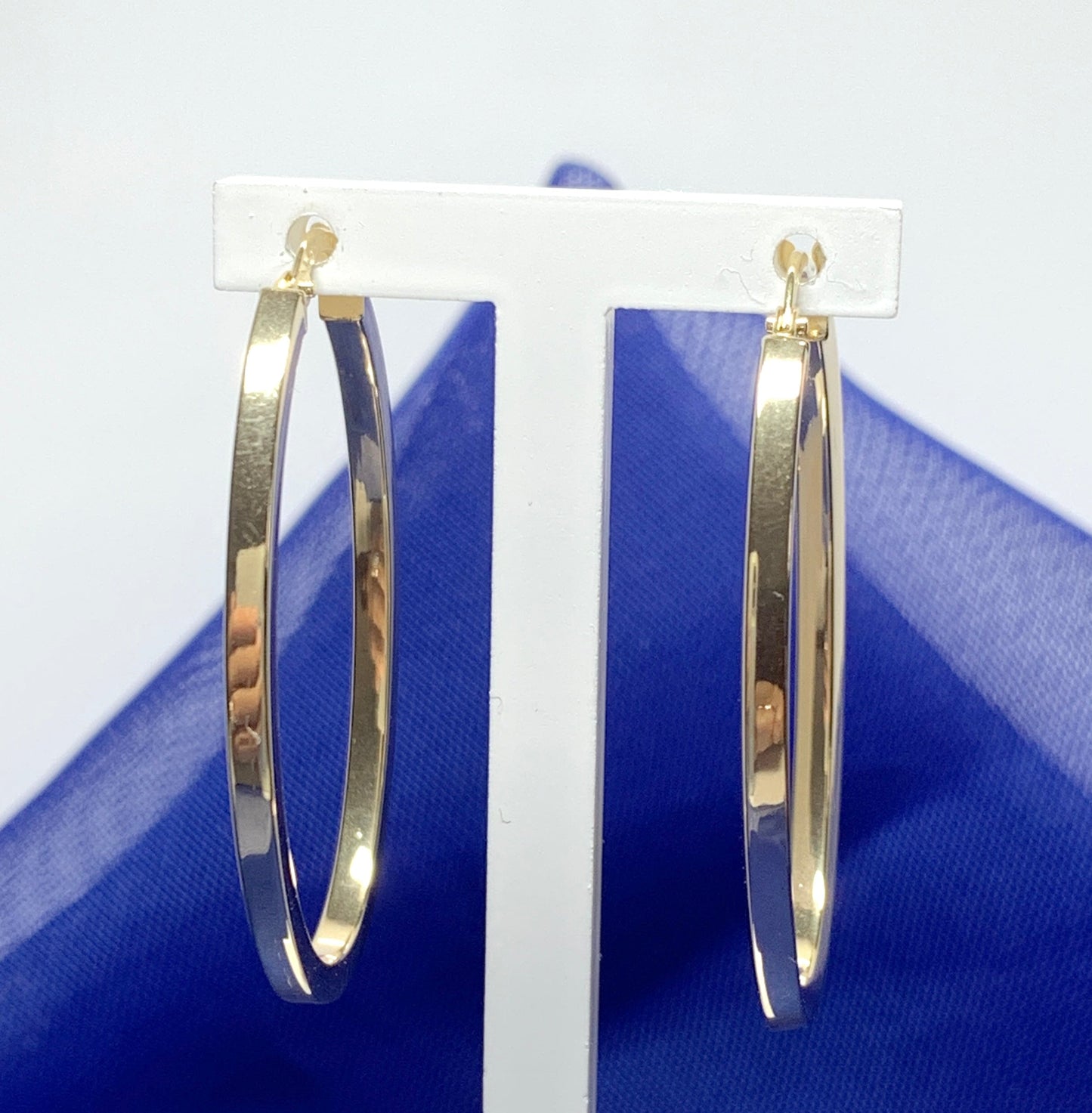 Yellow gold large oval hoop earrings plain polished