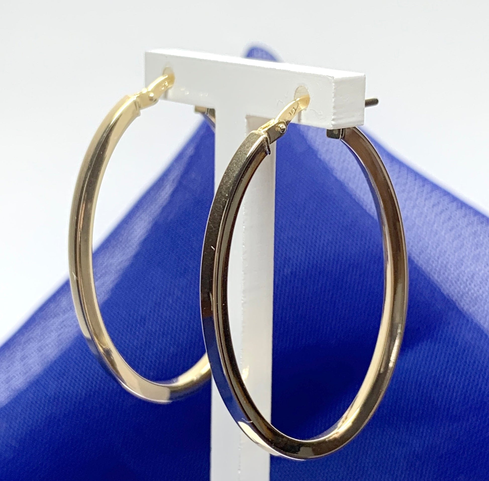 Yellow gold large oval hoop earrings plain polished