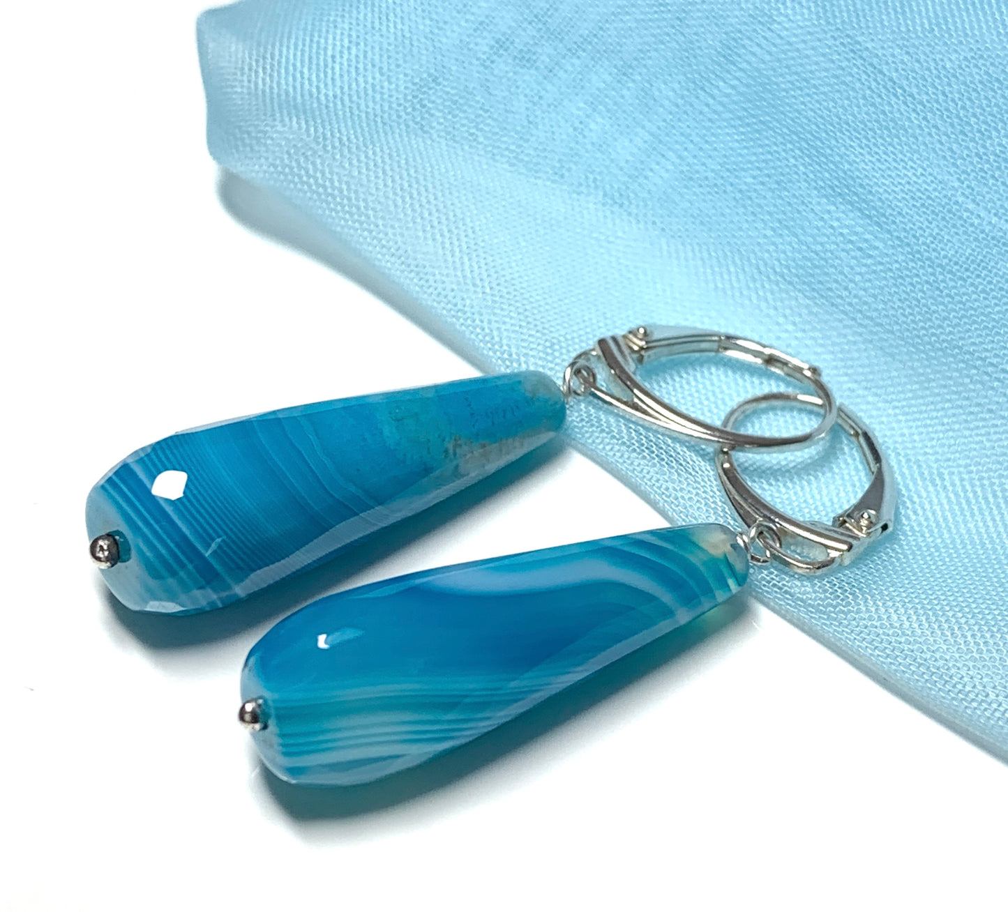 Light blue long teardrop shaped drop agate earrings continental wire fittings