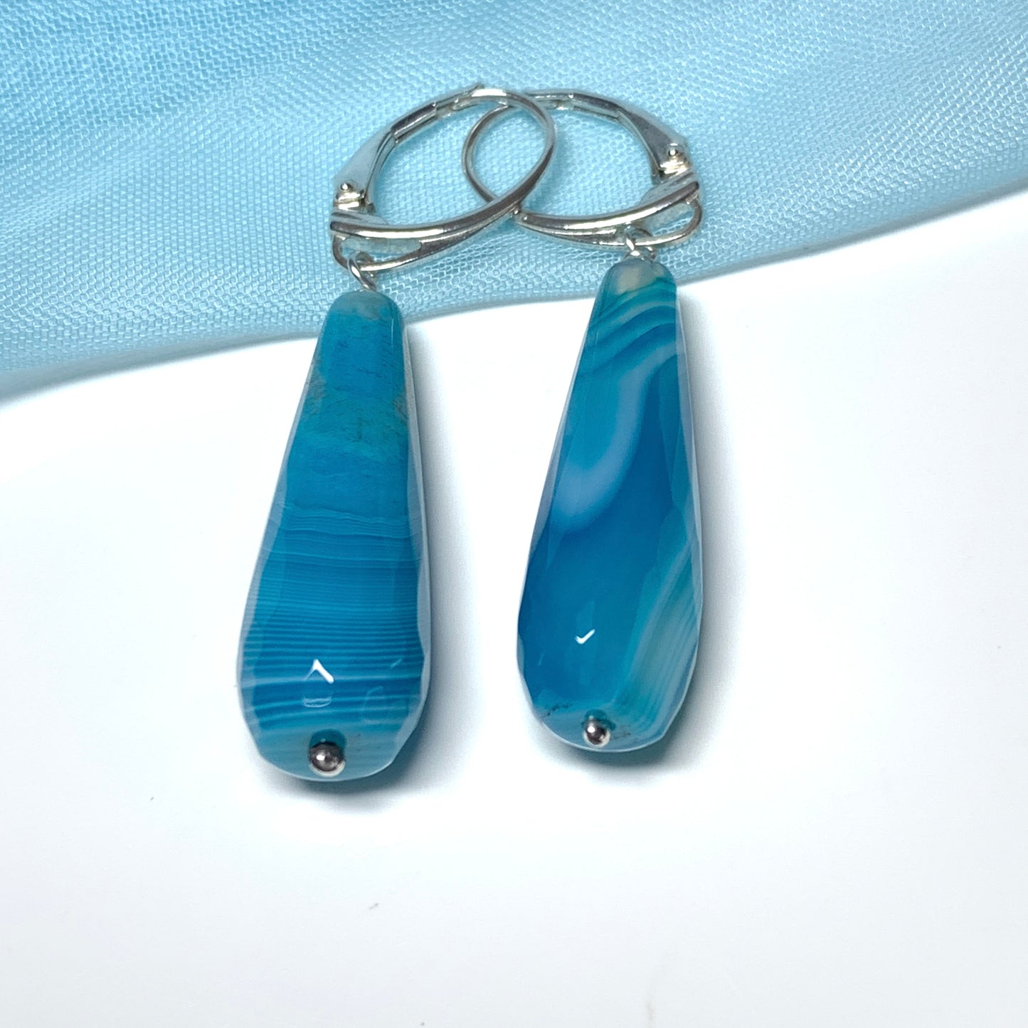 Light blue long teardrop shaped drop agate earrings continental wire fittings