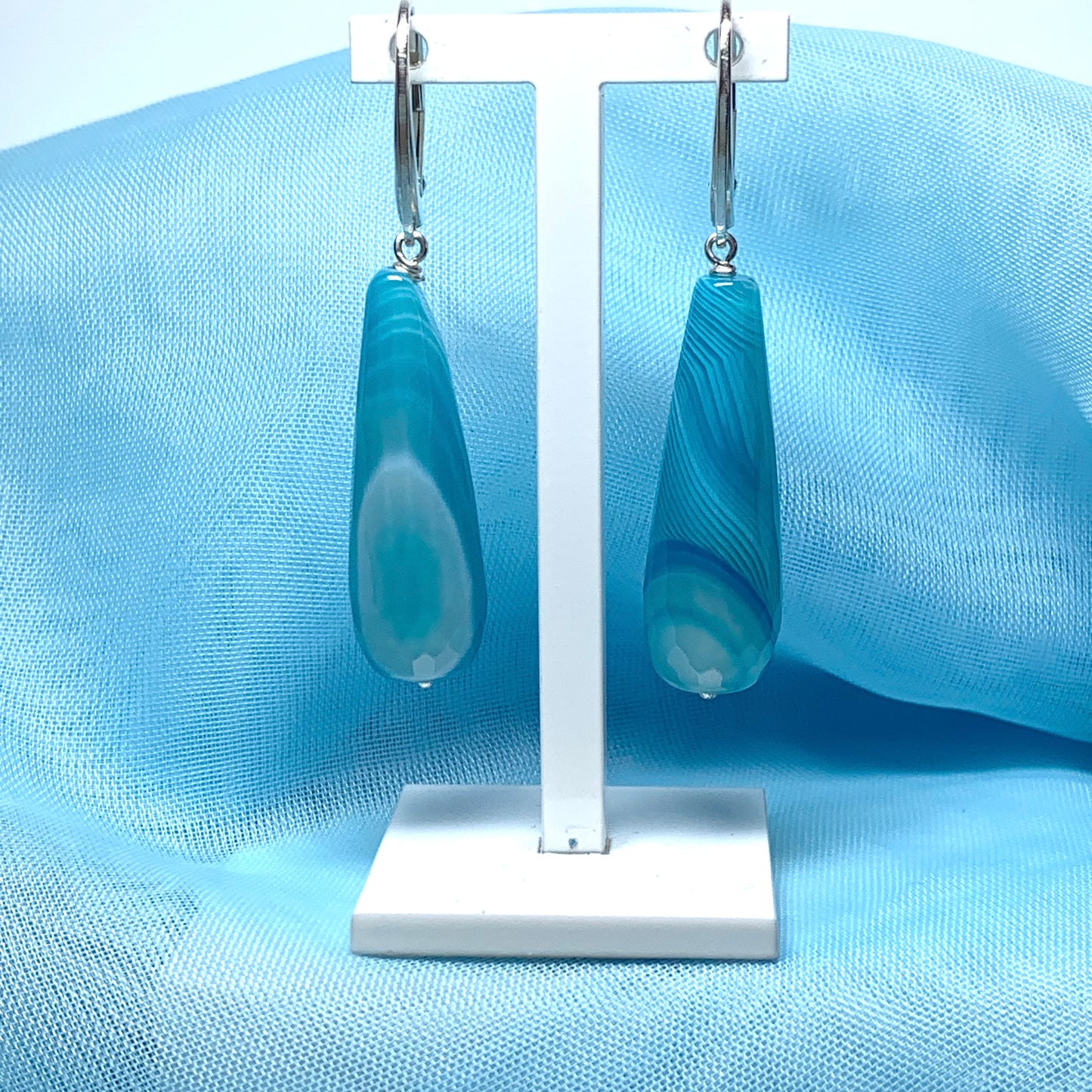 Light blue teardrop shaped long drop agate earrings