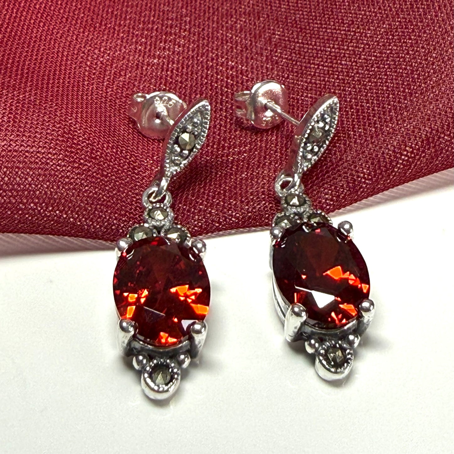 Marcasite sterling silver long drop earrings with garnet coloured stones