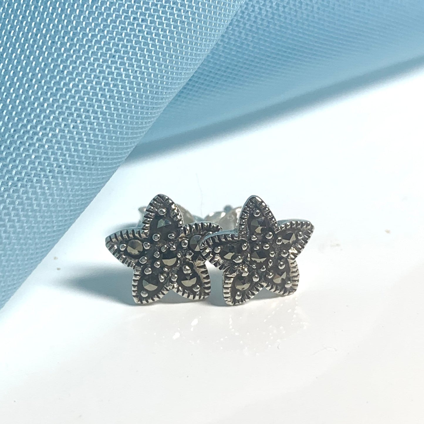 Marcasite star shaped sterling silver stud earrings