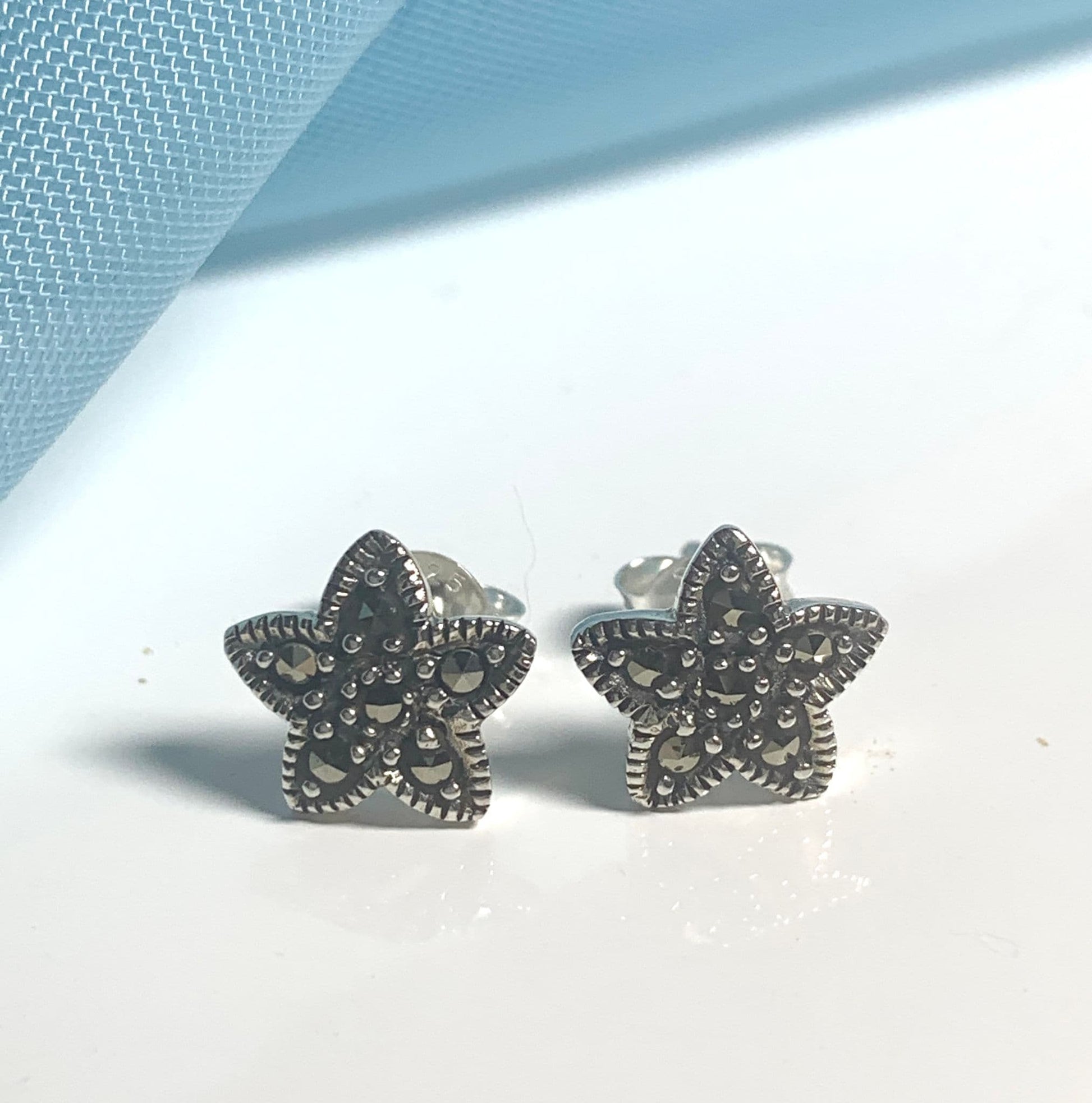 Marcasite star shaped sterling silver stud earrings