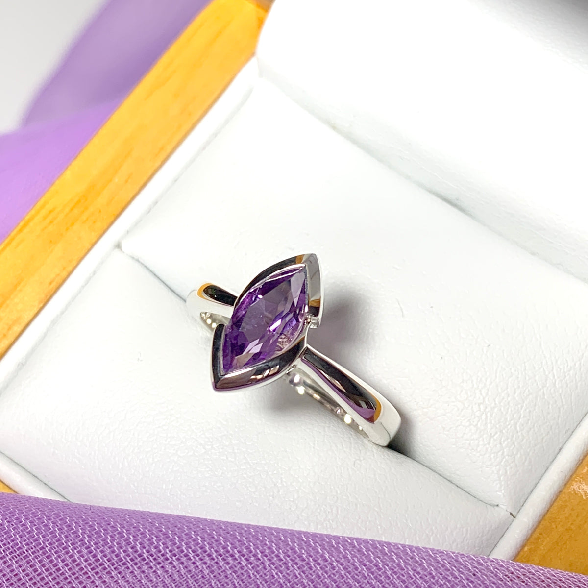 Marquise shaped amethyst sterling silver fancy dress cocktail ring