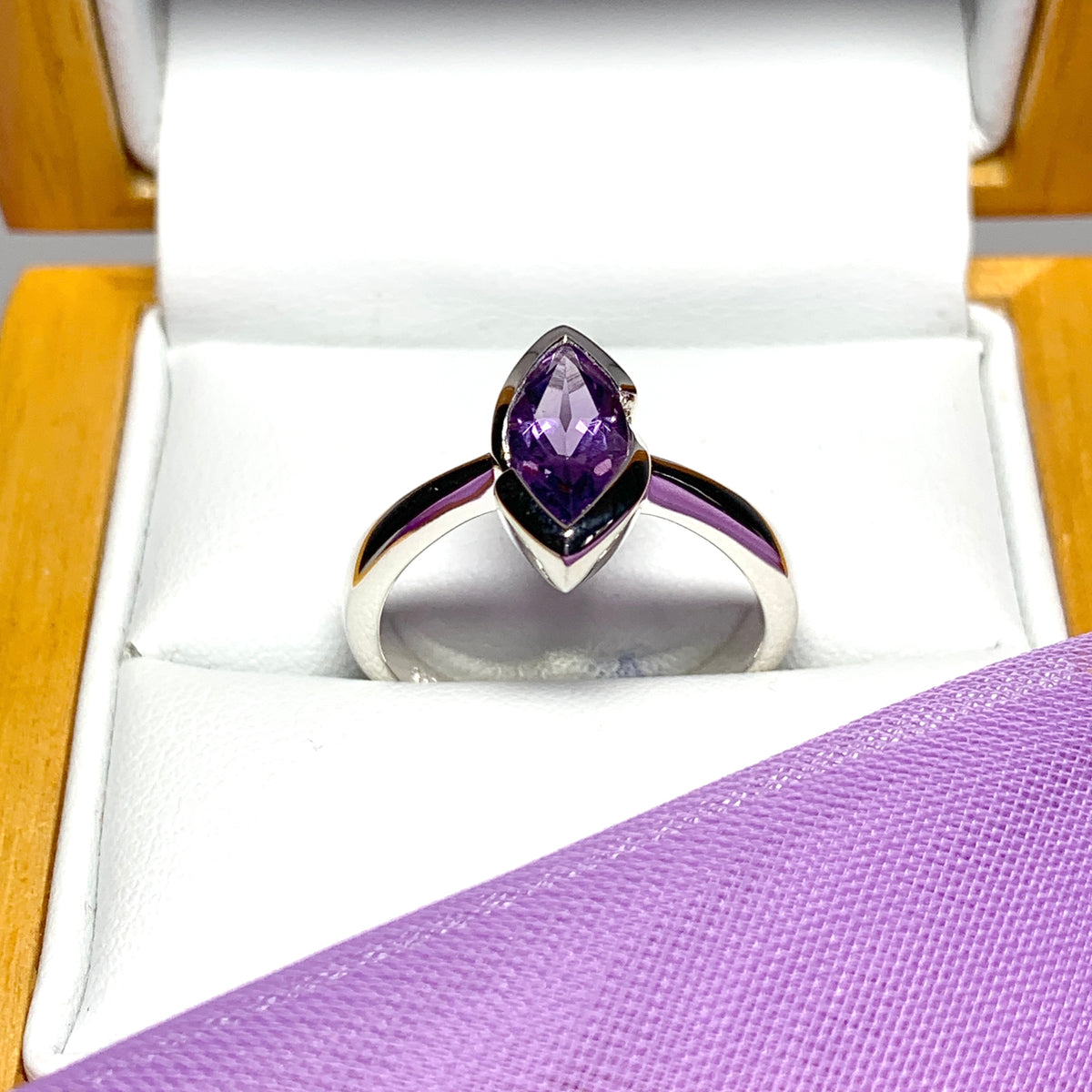 Marquise shaped amethyst sterling silver fancy dress cocktail ring
