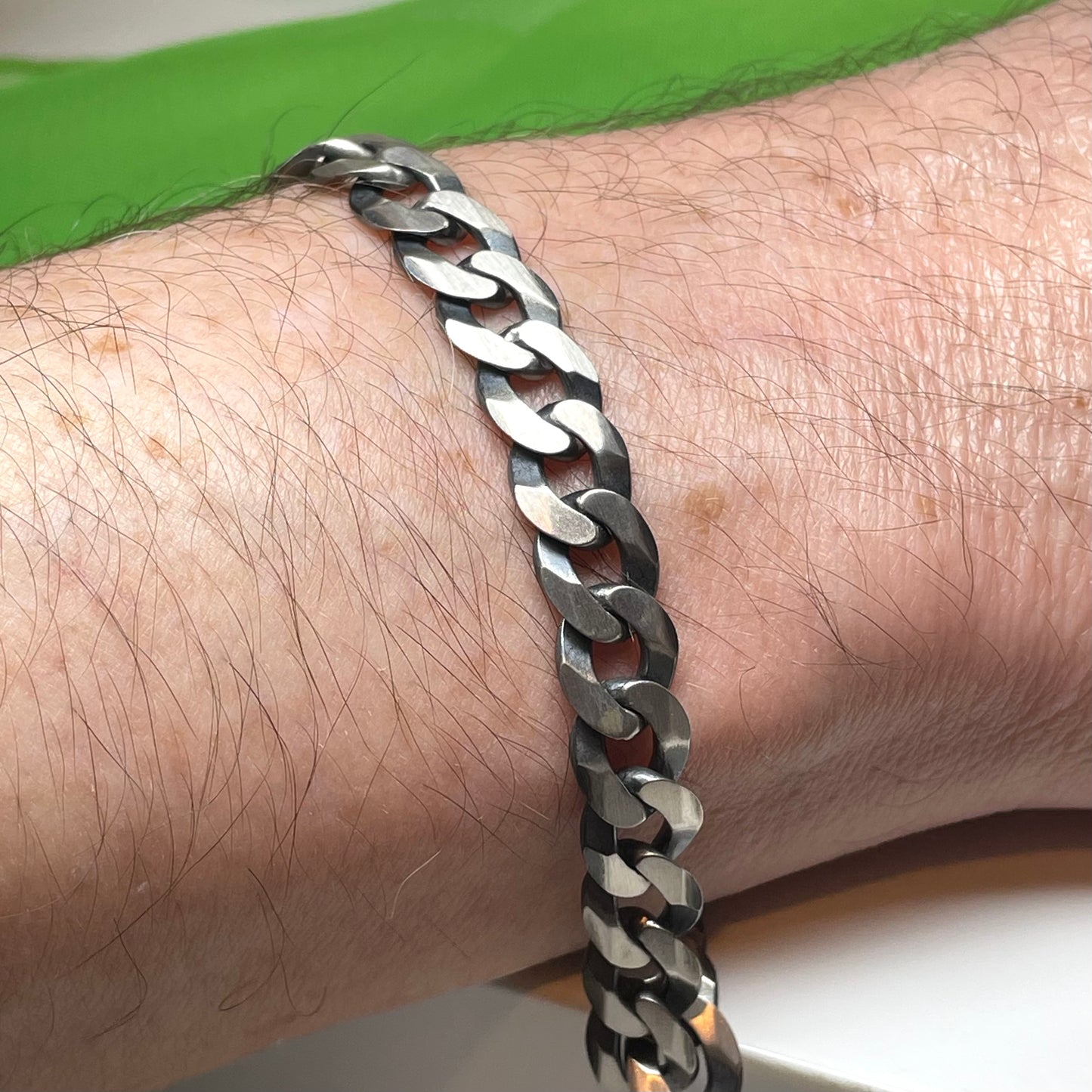 Men's heavy solid sterling silver 8.5 inch oxidised curb bracelet On the wrist