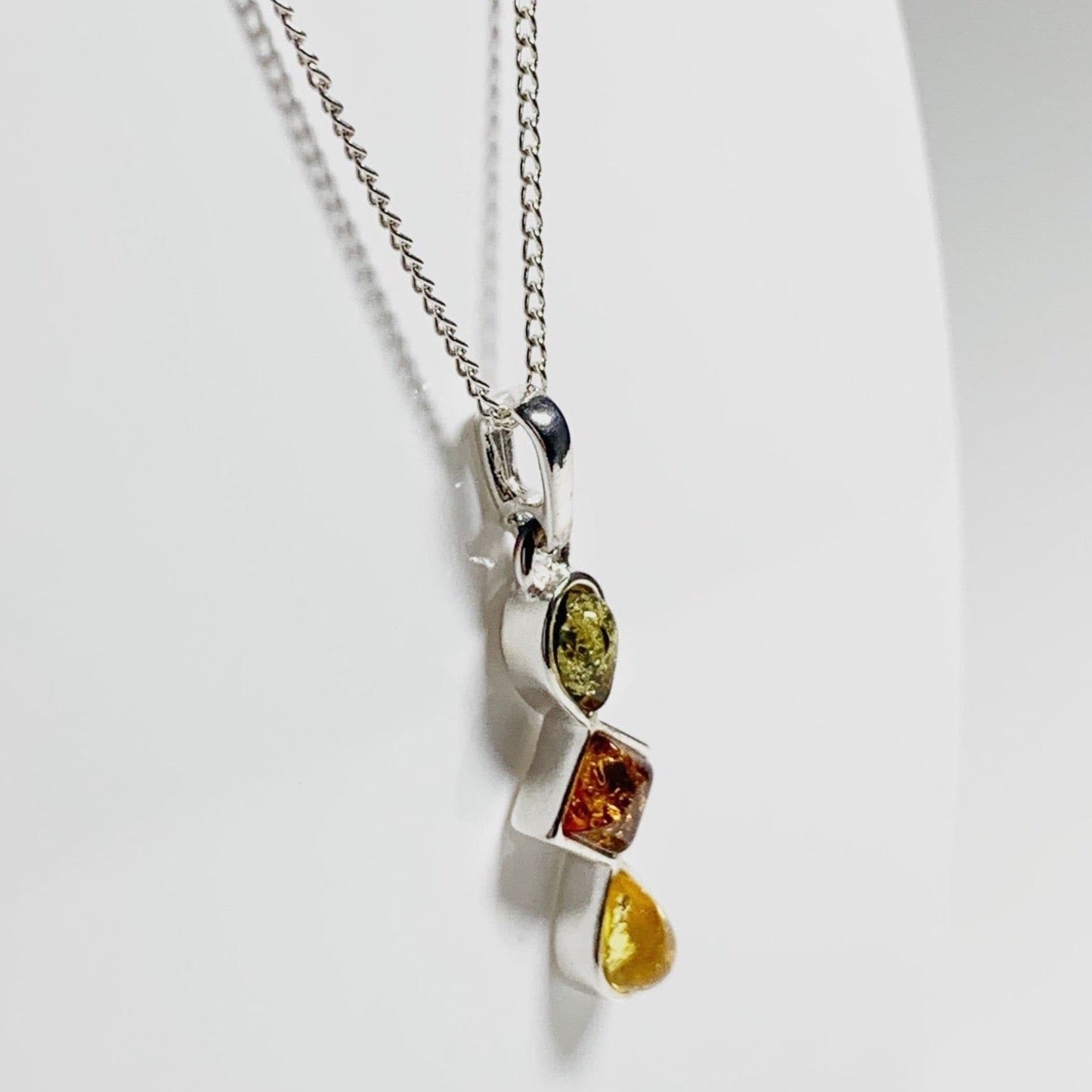 Multi coloured amber sterling silver necklace