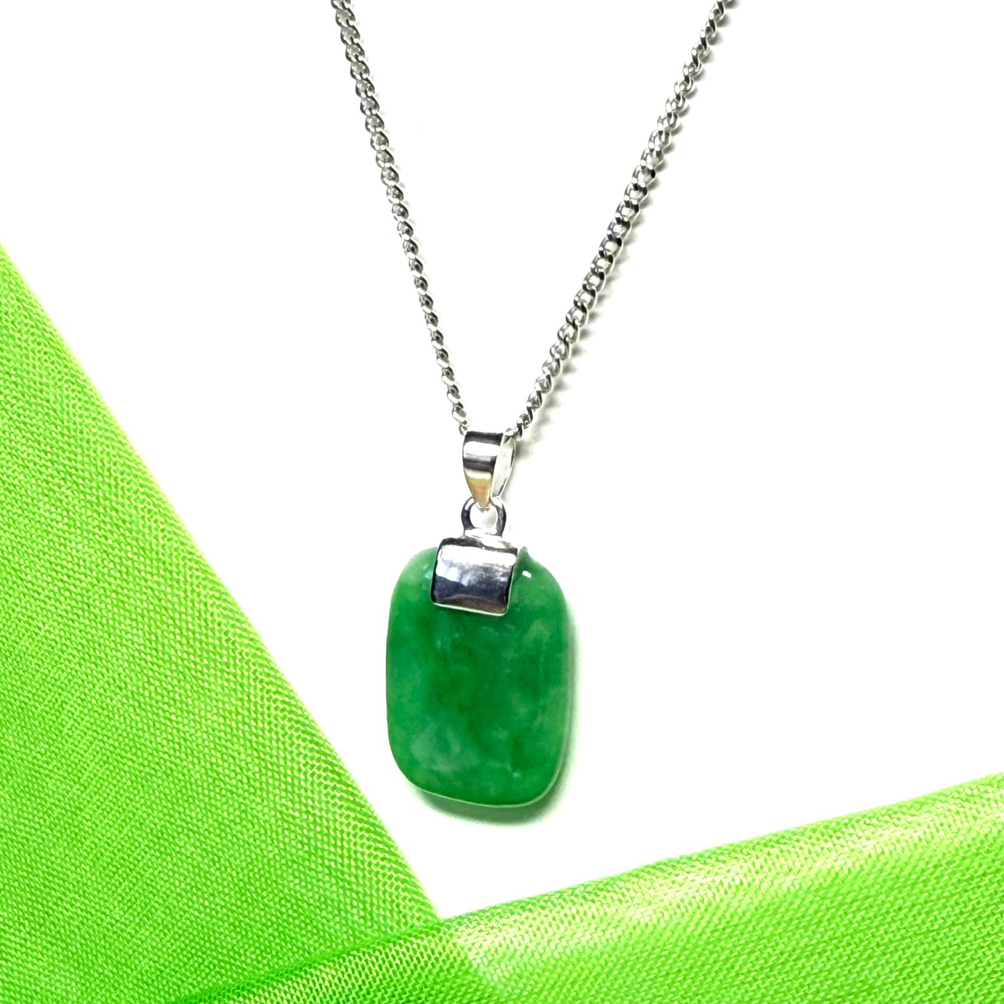 Necklace pendant having real green jade sterling silver cushion shaped with a chain included