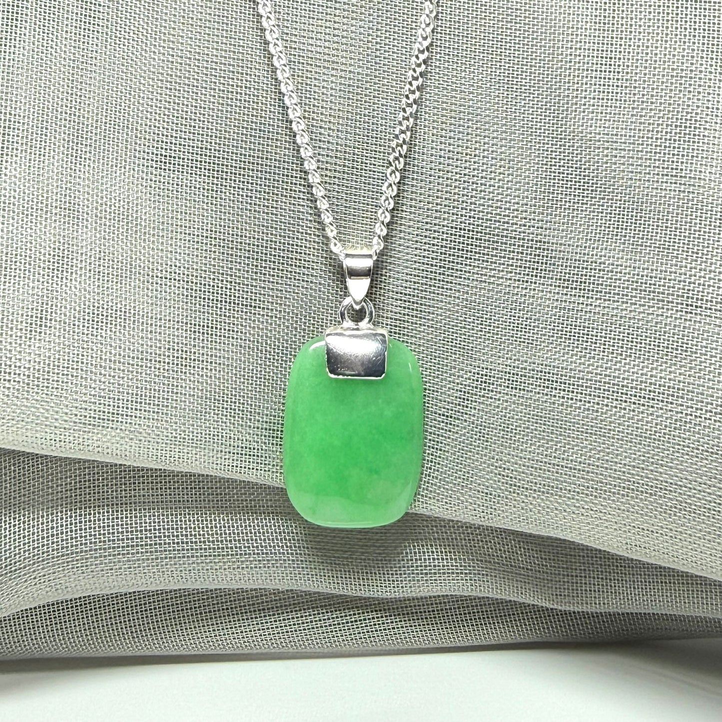 Necklace pendant having real green jade sterling silver cushion shape, stunning