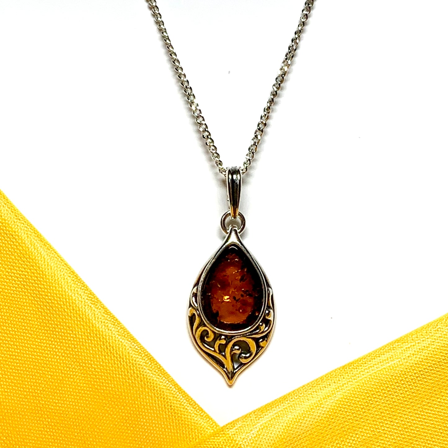 Necklace real amber pear shaped sterling silver pierced patterned pendant including chain