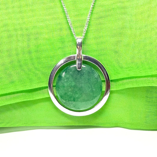 Necklace real dark green jade large round shape with a beautiful designed halo pendant, whispers of a dark green amulet