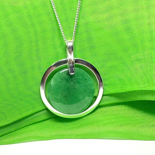 Necklace real dark green jade large round shape with a beautiful designed halo pendant, a hint of dark green with a chain