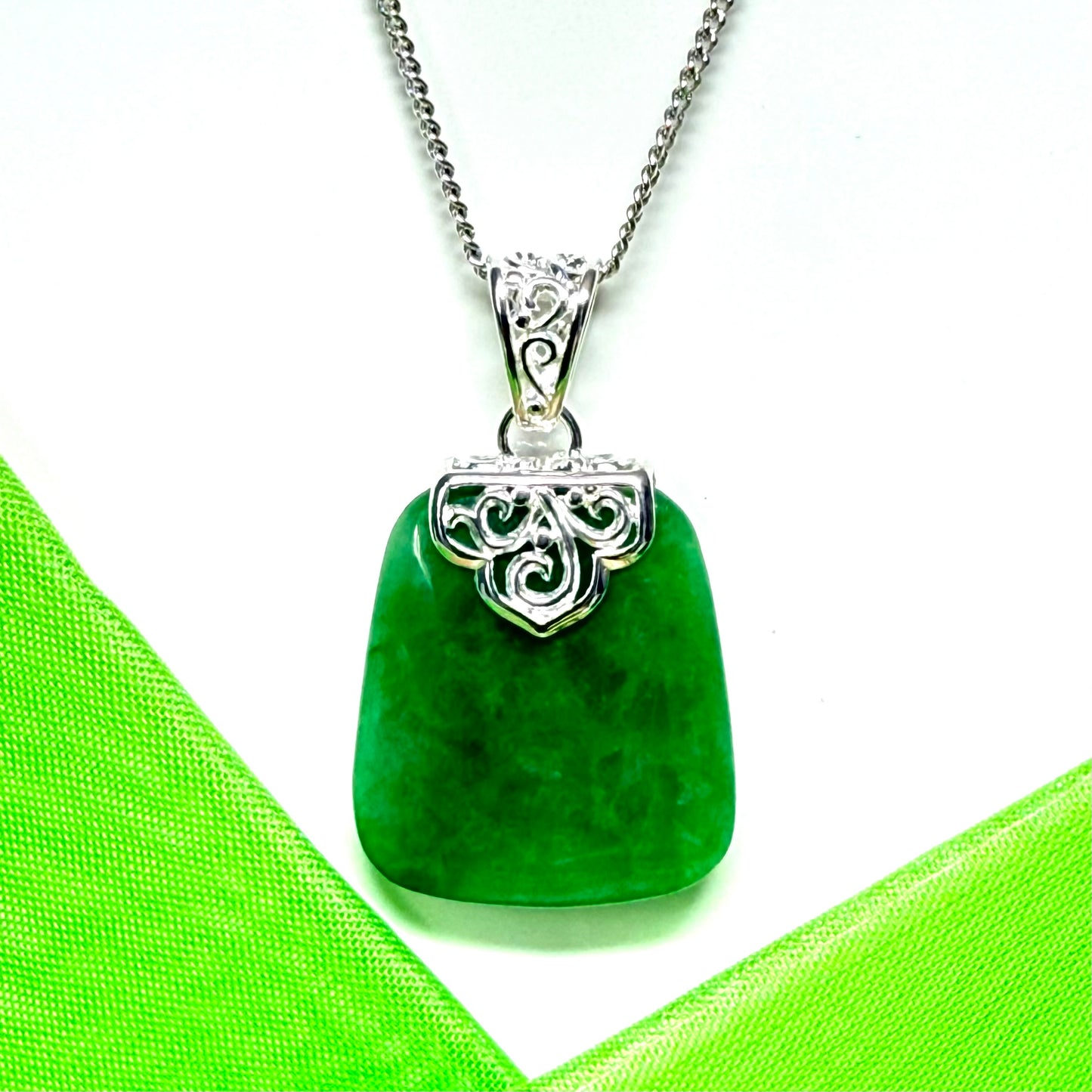 Necklace with a real green jade stone, large cushion shaped pendant with a chain included