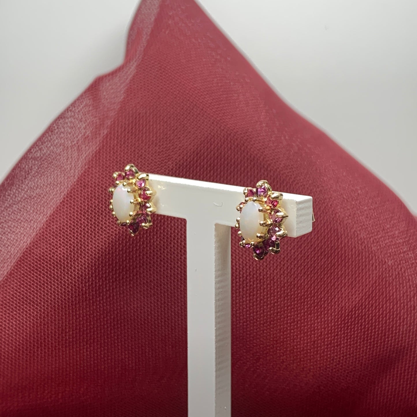 Opal and real ruby oval cluster stud earrings yellow gold