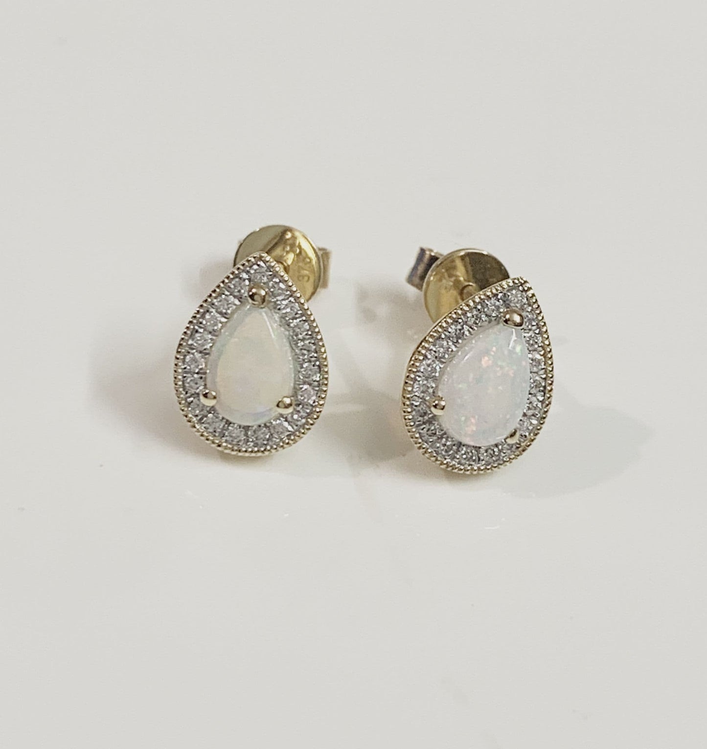 Pear teardrop opal and diamond yellow gold stud cluster earrings