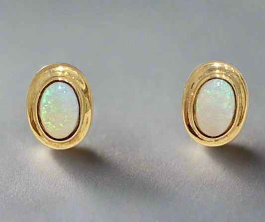 Opal yellow gold rubbed over oval earrings