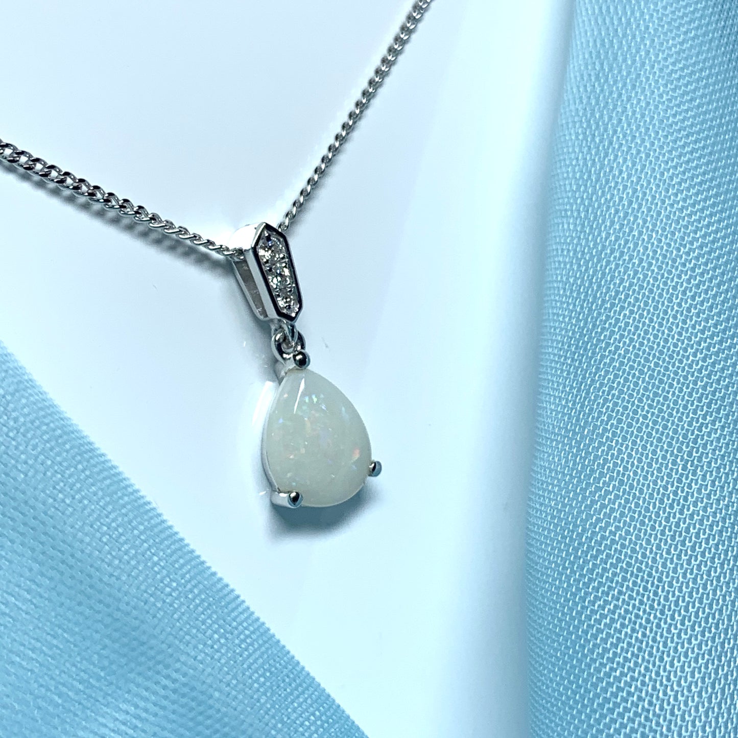 White gold real opal and diamond pear shaped necklace