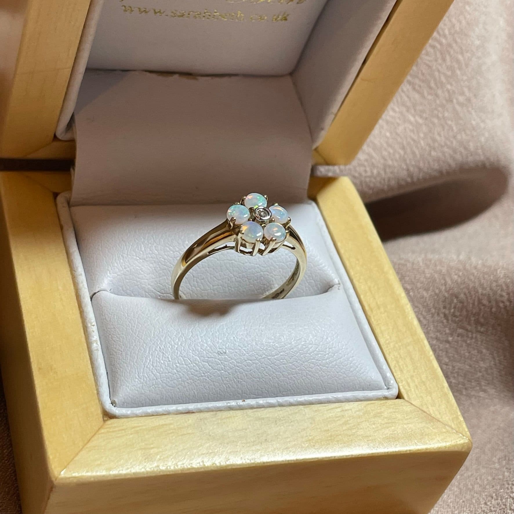 Opal and diamond yellow gold daisy cluster ring