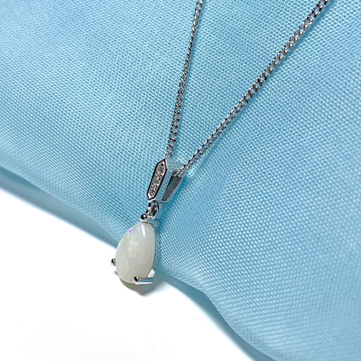 White gold real opal and diamond pear shaped necklace