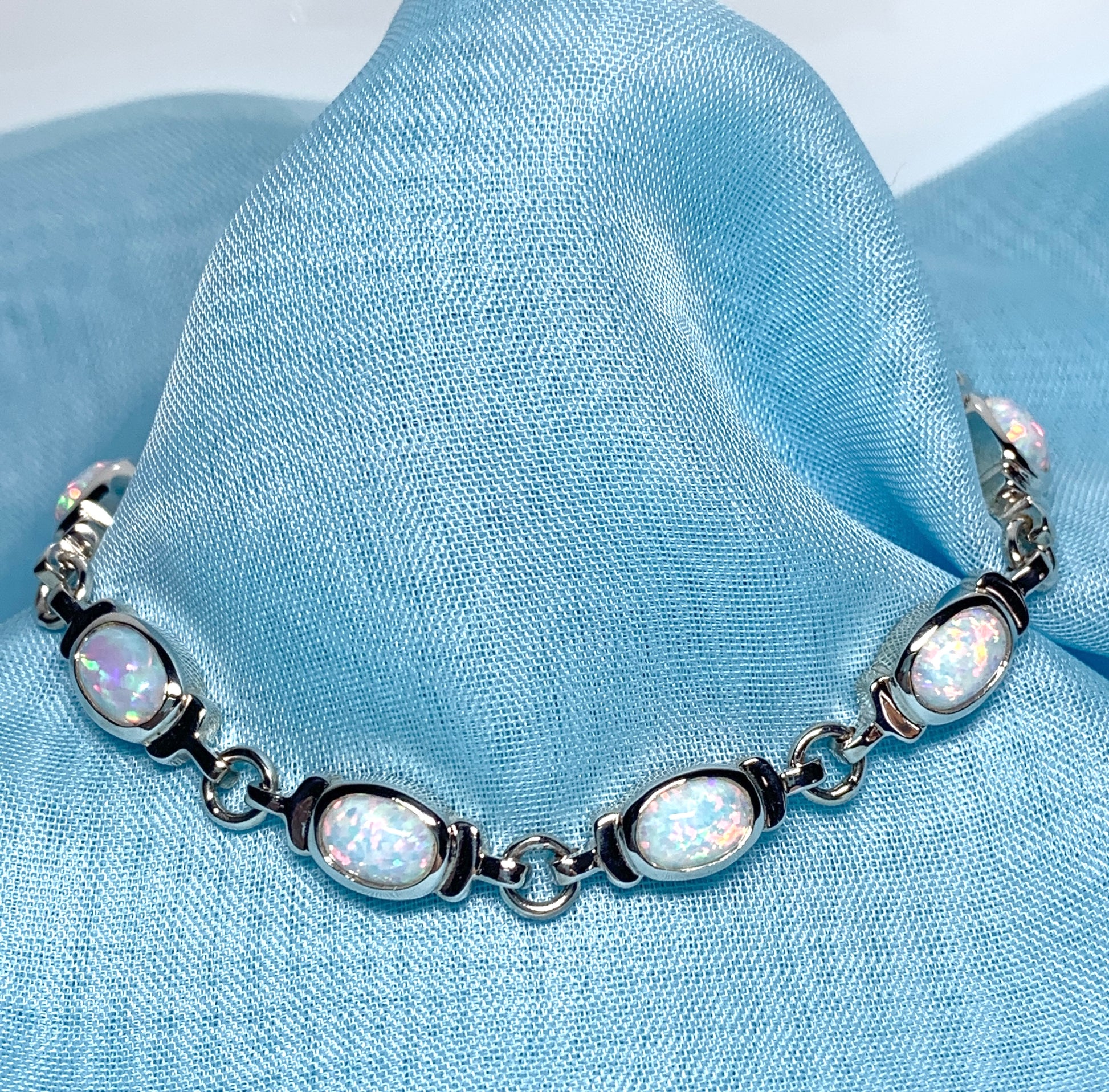 Opal sterling silver fancy oval bracelet