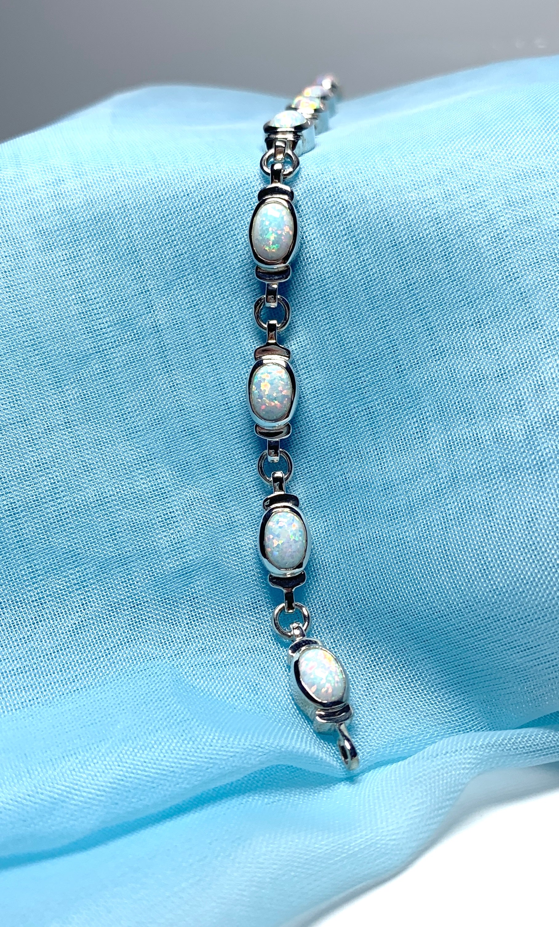 Opal sterling silver fancy oval bracelet
