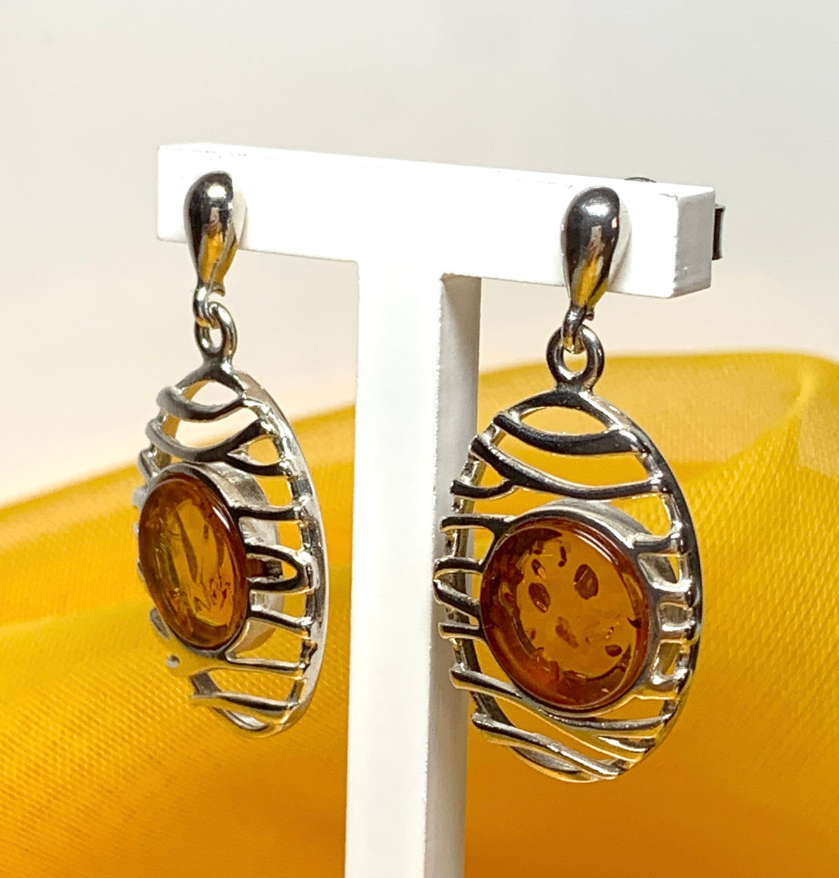 Orange real amber oval pierced open drop earrings sterling silver