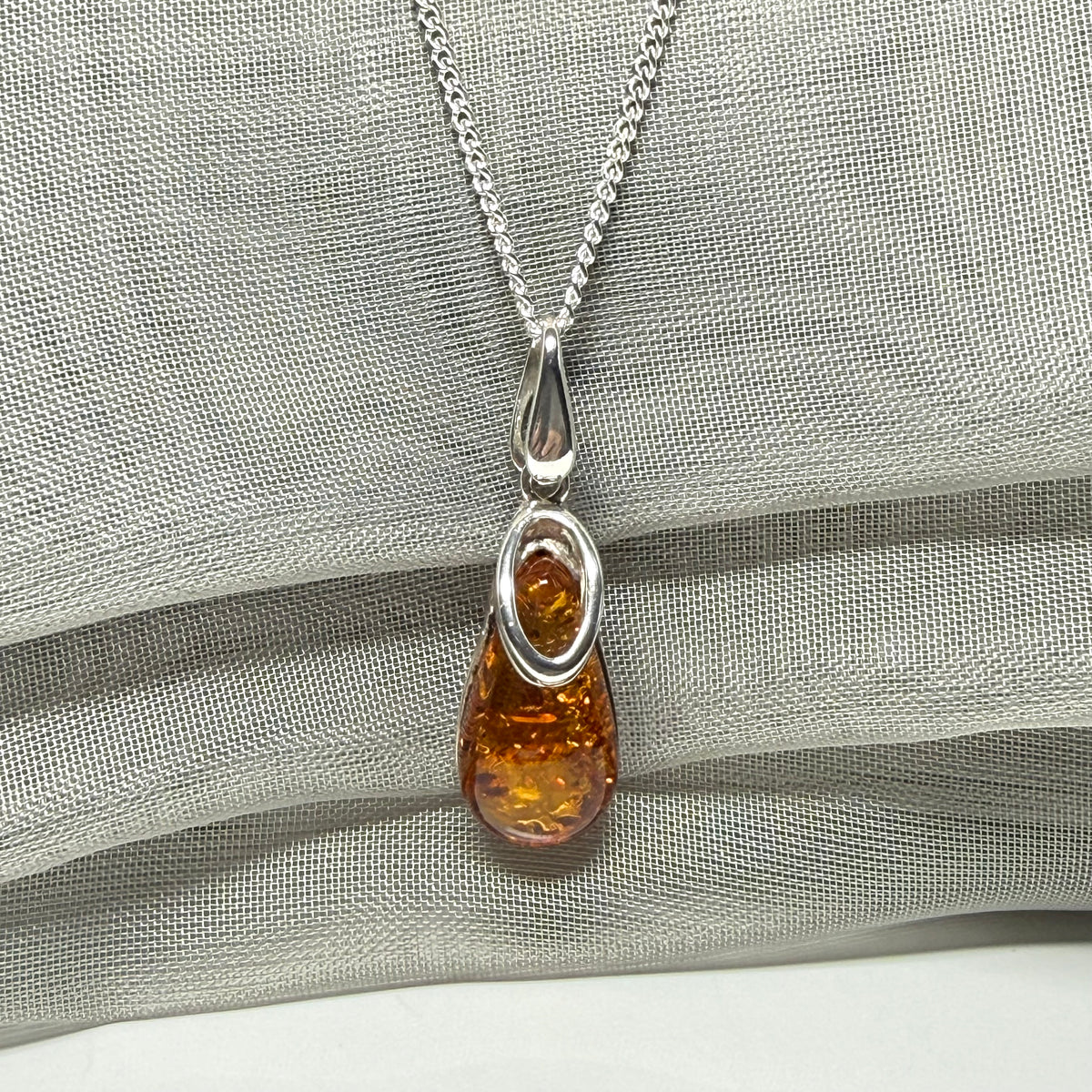Orange real amber tear drop sterling silver necklace