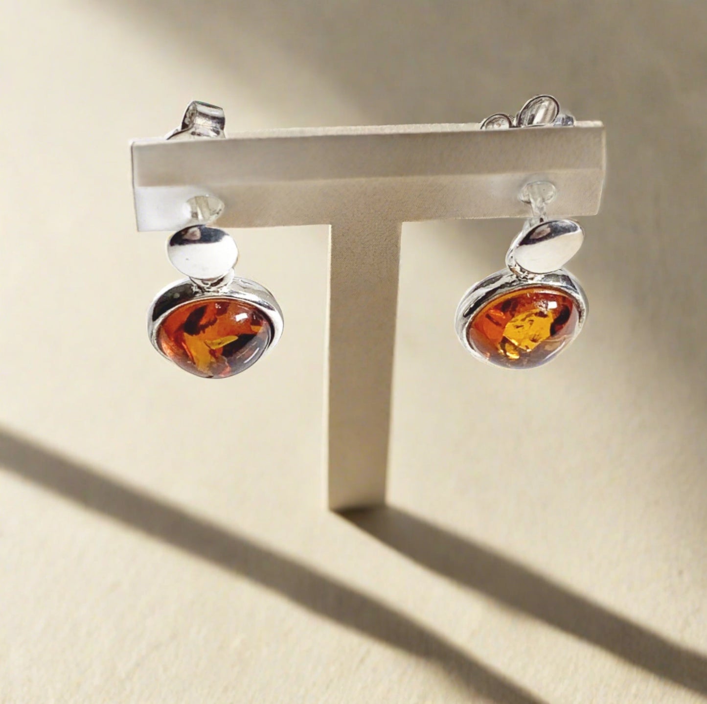 Orange amber round drop sterling silver earrings