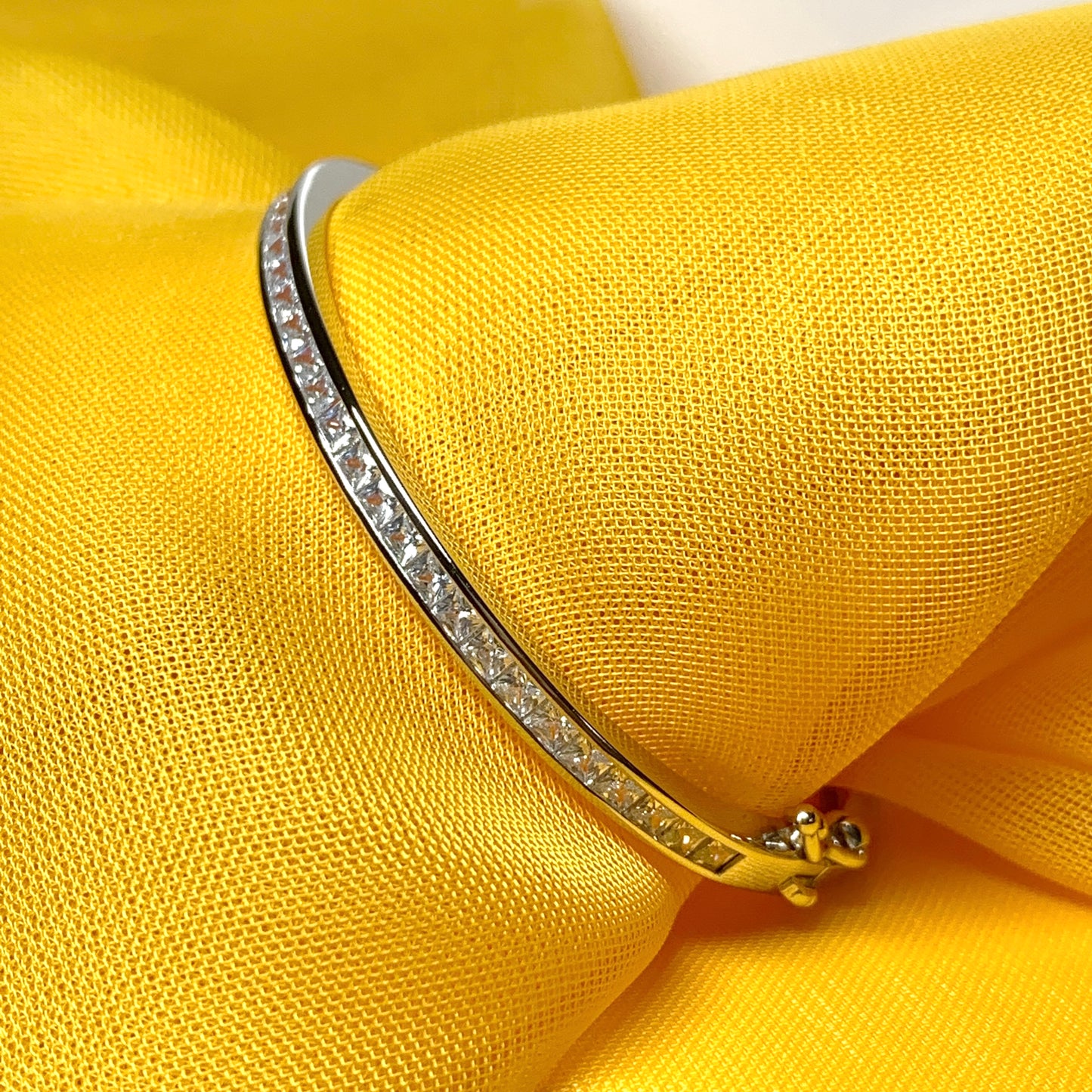 Oval Bangle With Princess Cut Cubic Zirconia Sterling Silver Channel Set