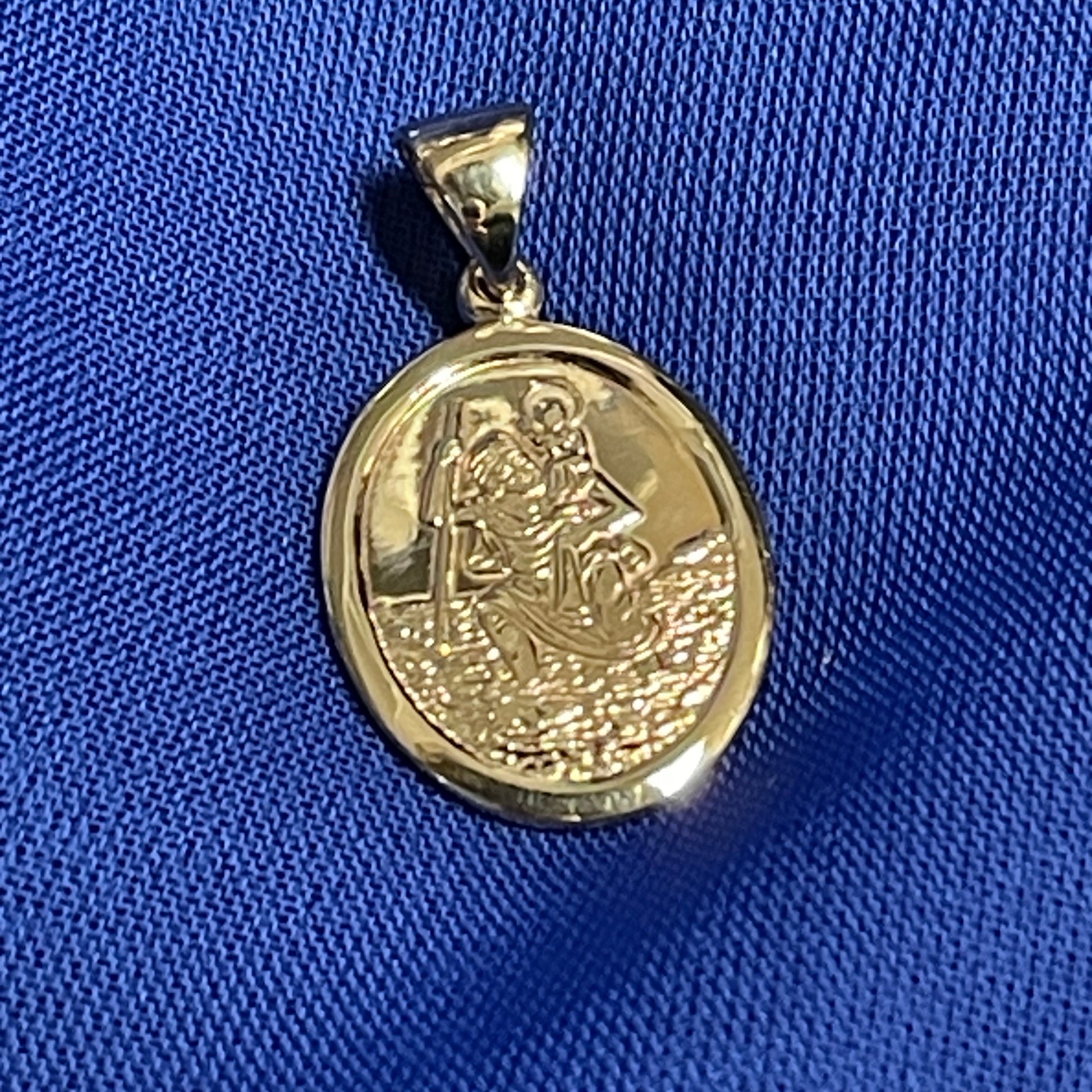 Oval St. Christopher solid 9 carat yellow gold