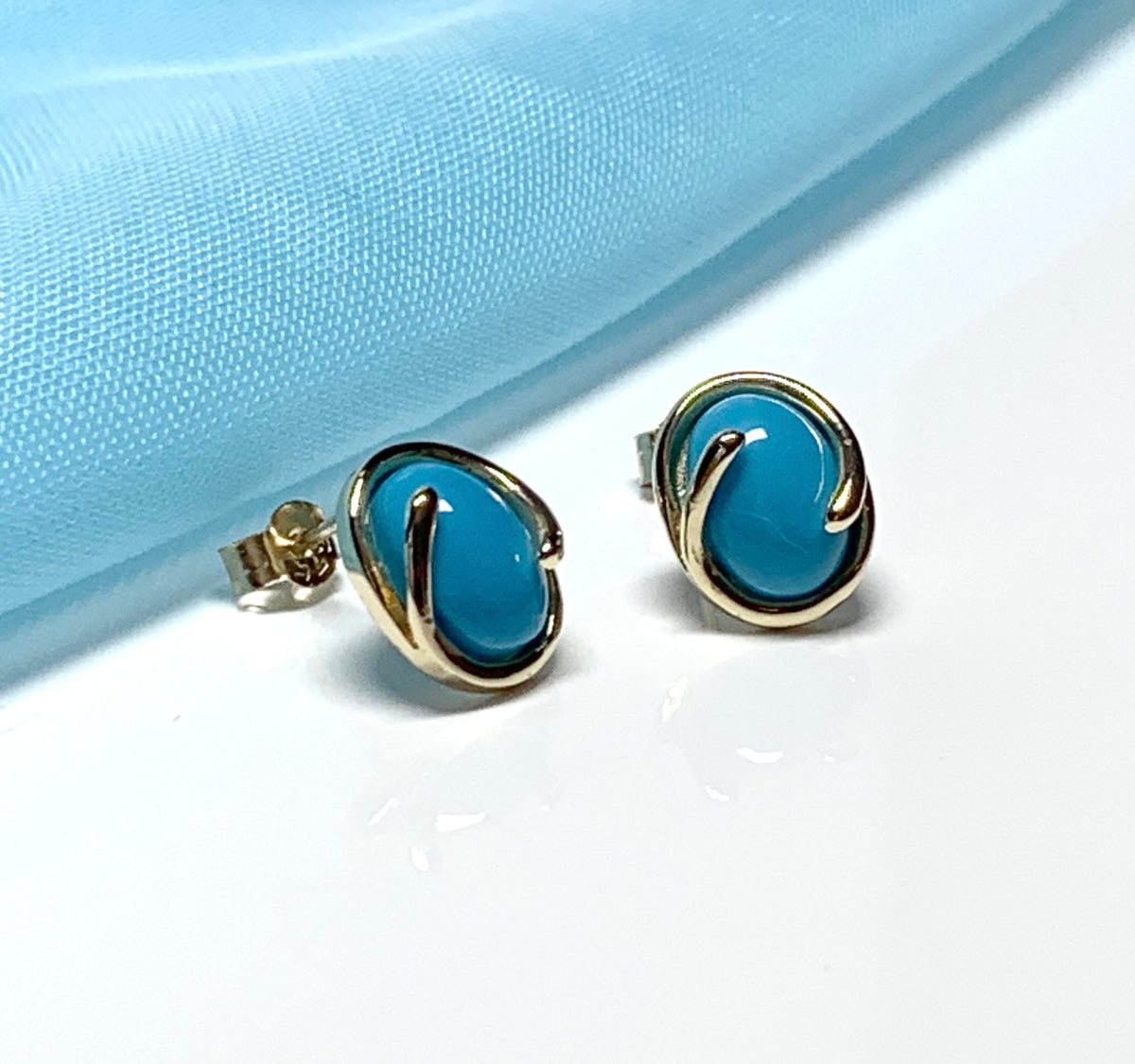 Oval blue yellow gold turquoise stud earrings