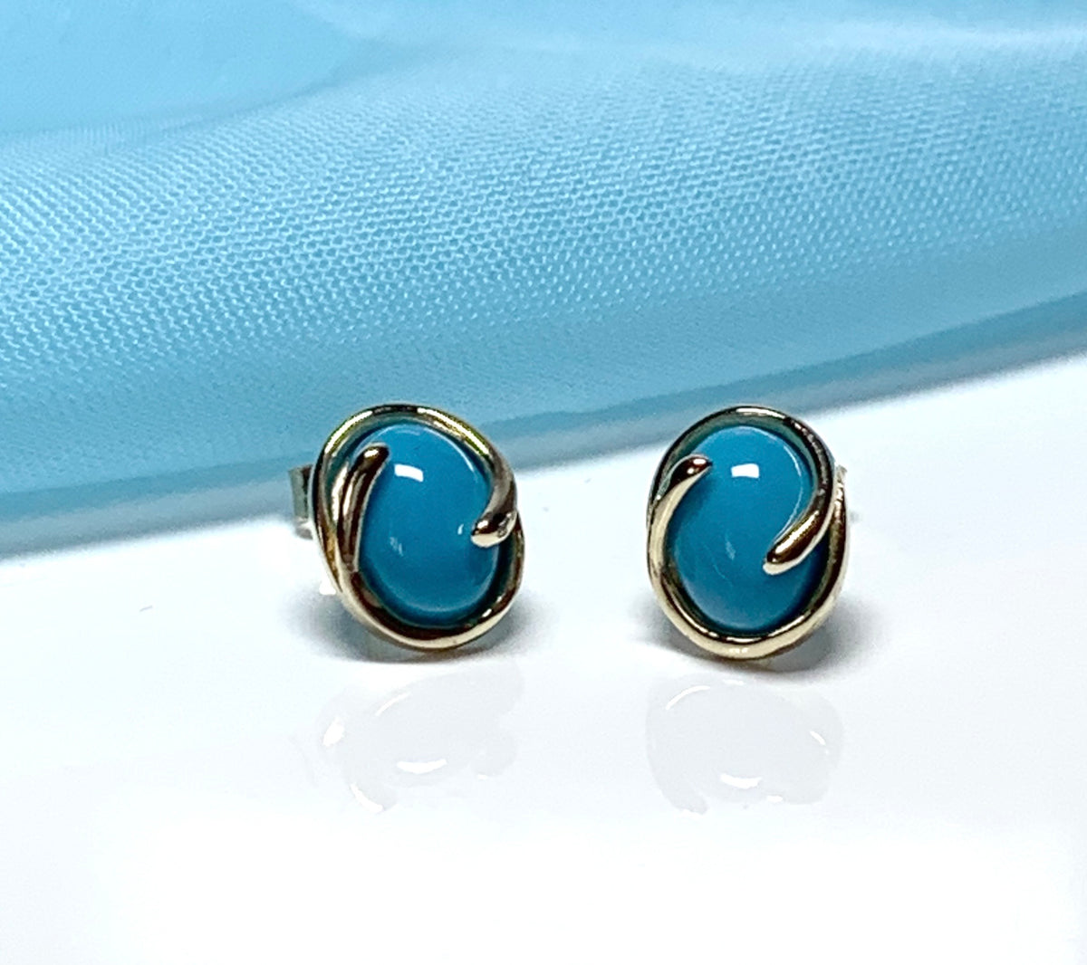 Oval blue yellow gold turquoise stud earrings