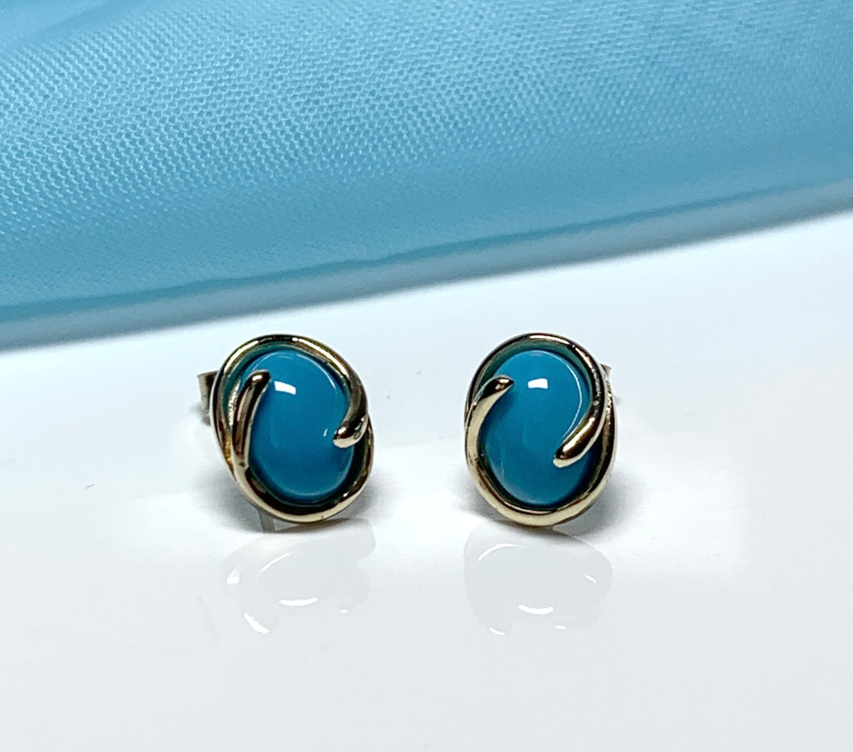 Oval blue yellow gold turquoise stud earrings