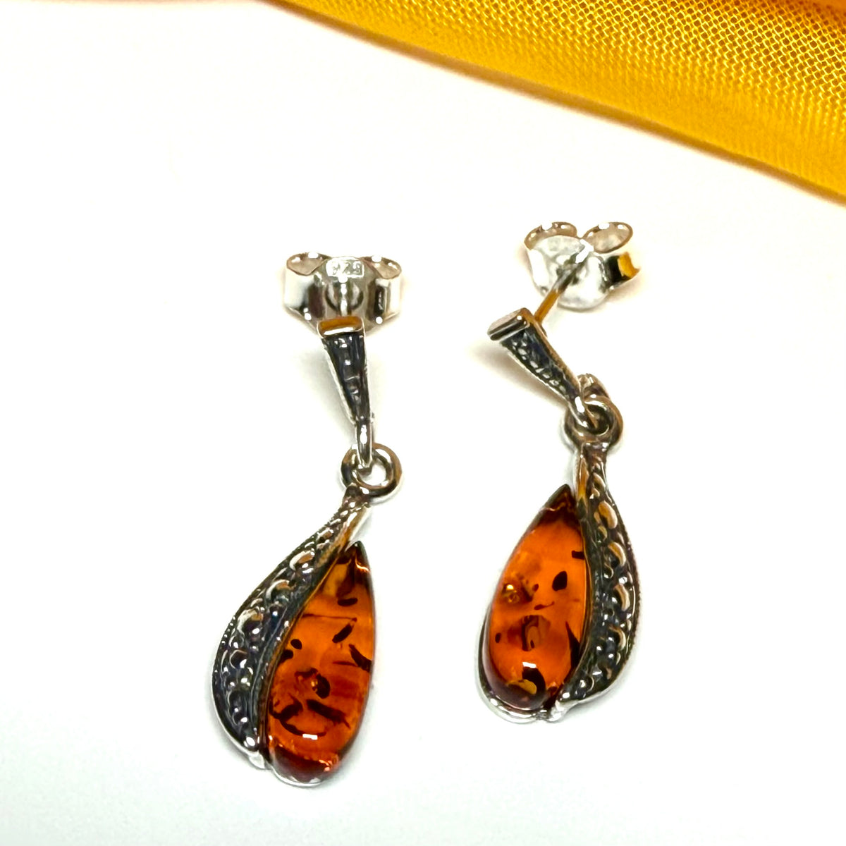Oval real amber sterling silver fancy drop earrings