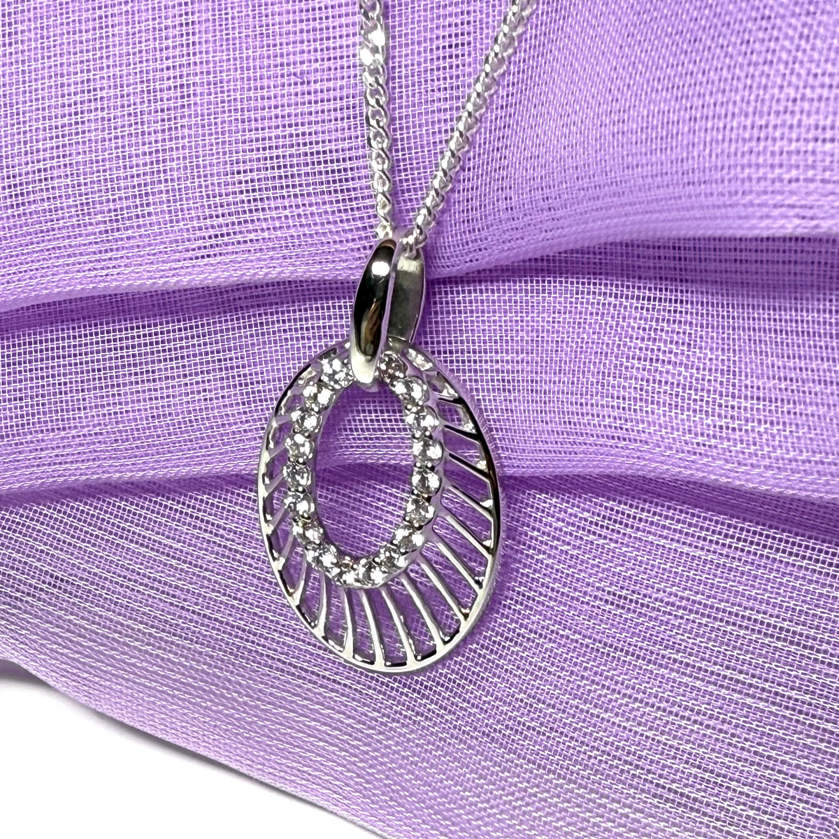 An oval shaped cubic zirconia sterling silver necklace