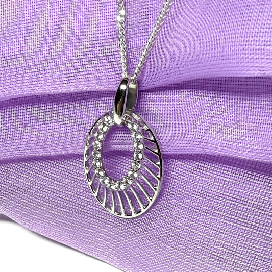An oval shaped cubic zirconia sterling silver necklace