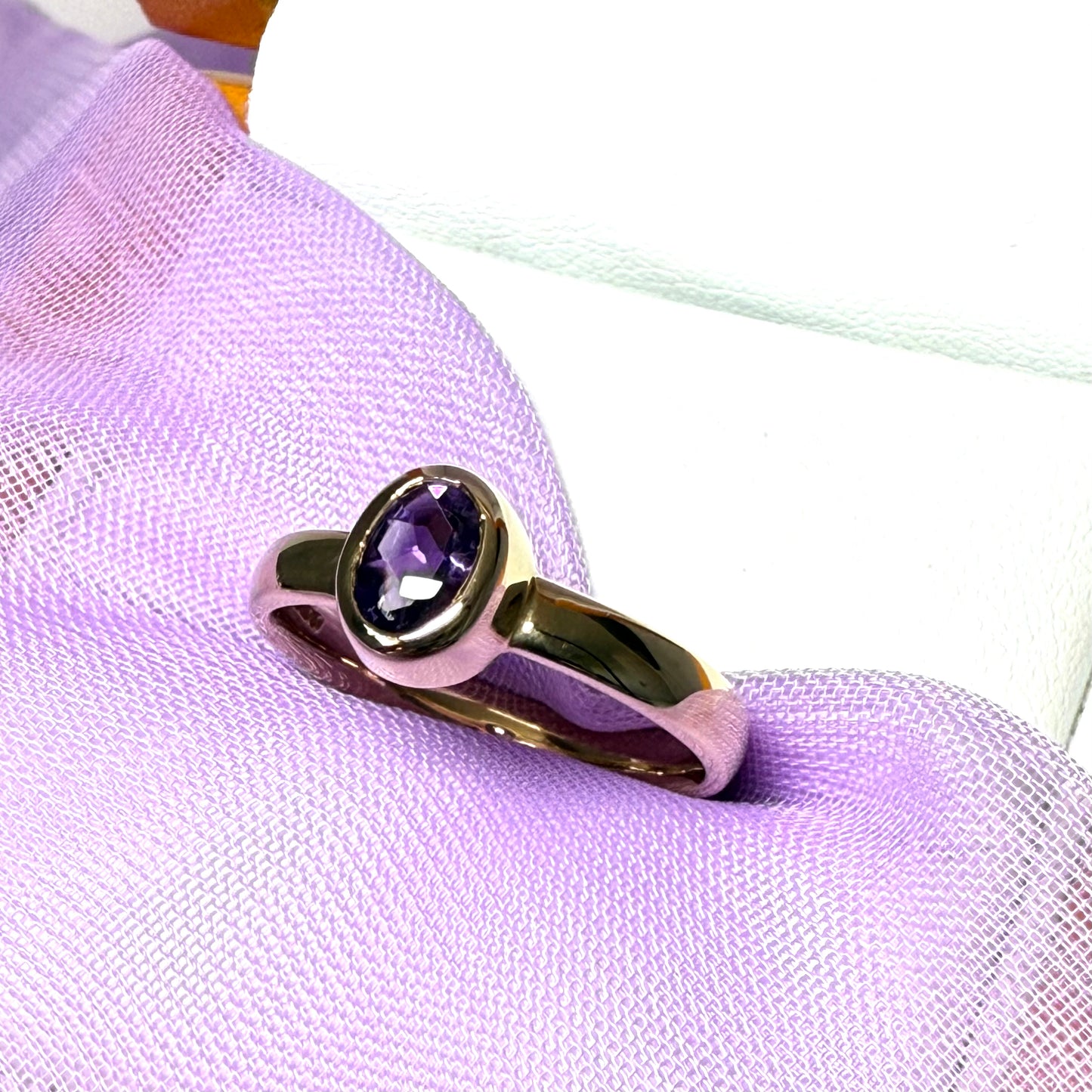 Oval shaped real amethyst yellow gold dress ring