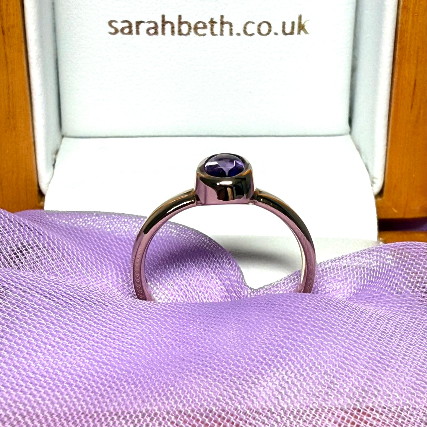 Oval shaped real amethyst dress ring yellow gold