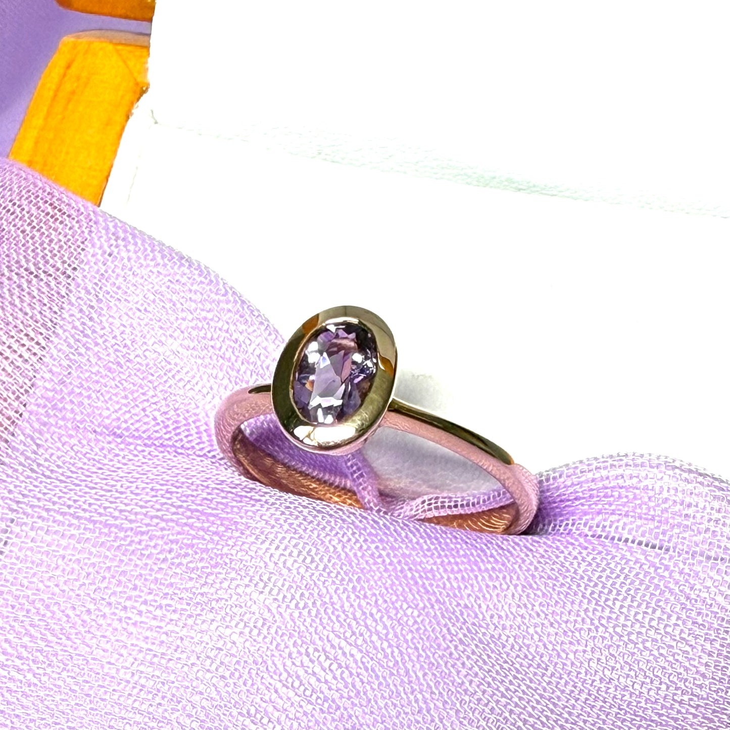 Oval shaped real amethyst yellow gold dress ring