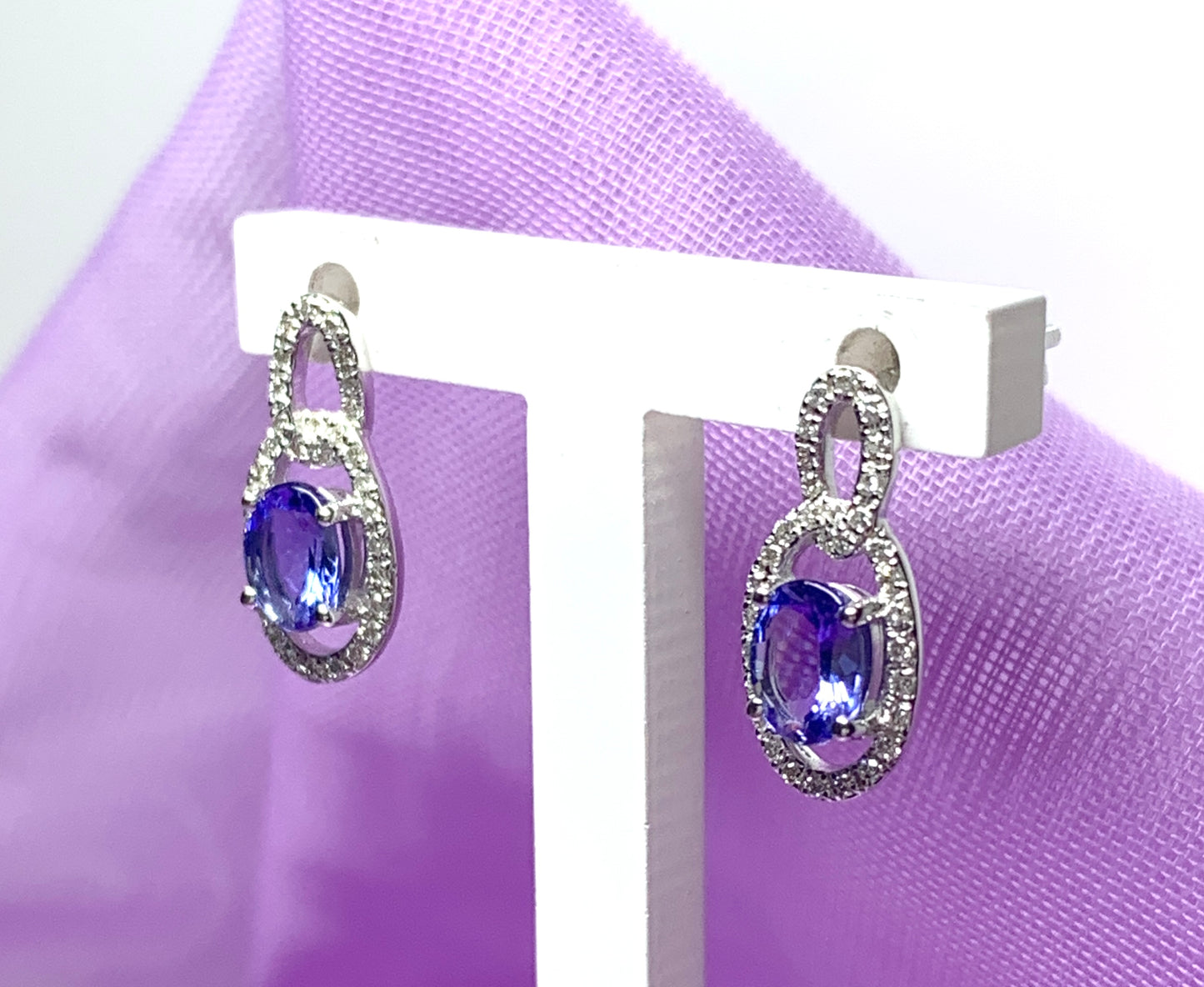 Oval cluster tanzanite and diamond earrings