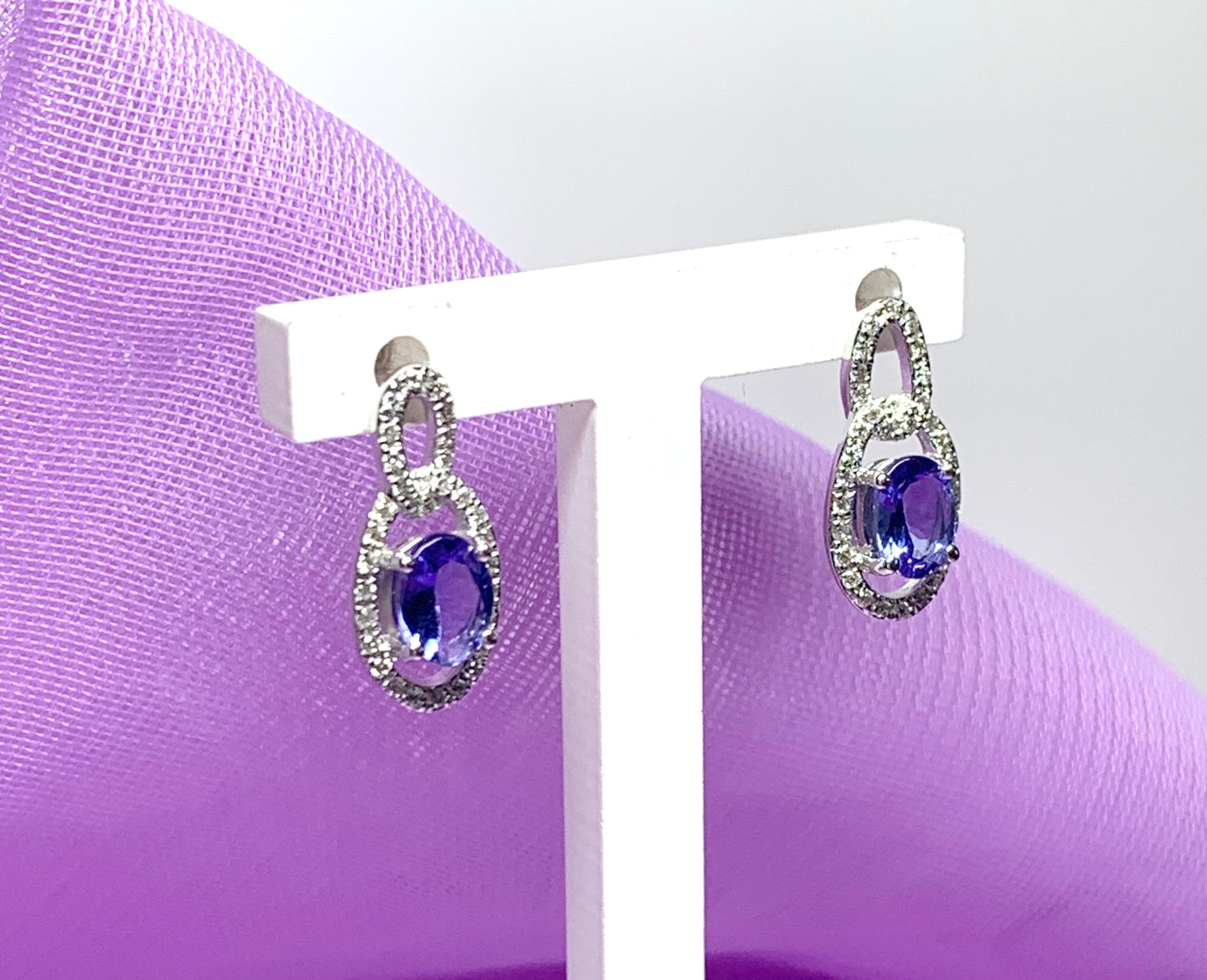 Oval cluster tanzanite and diamond earrings