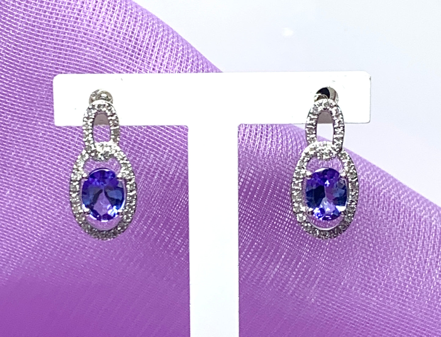 Oval cluster tanzanite and diamond earrings