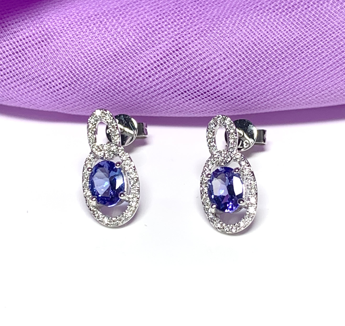 Oval cluster tanzanite and diamond earrings