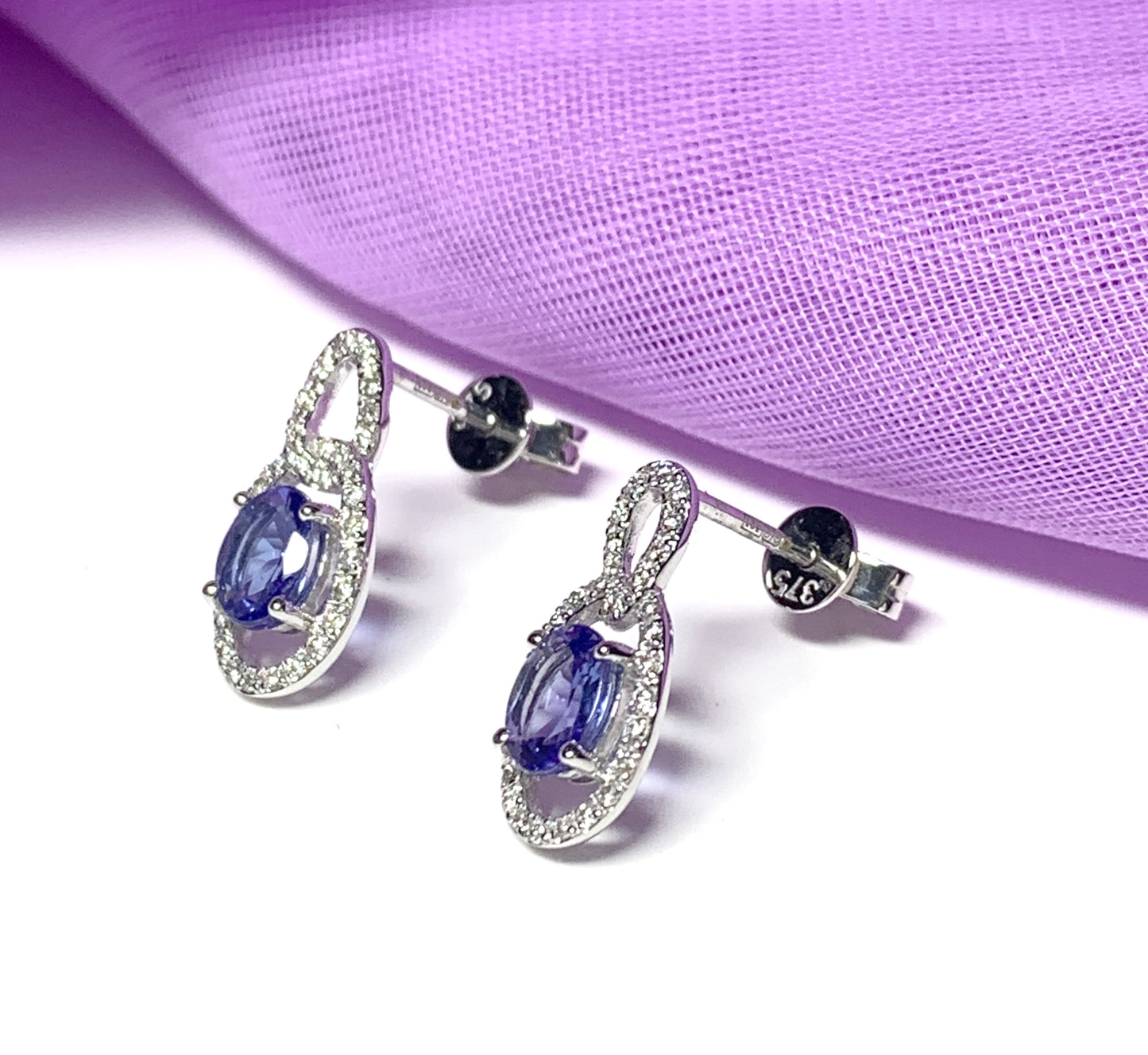 Oval cluster tanzanite and diamond earrings