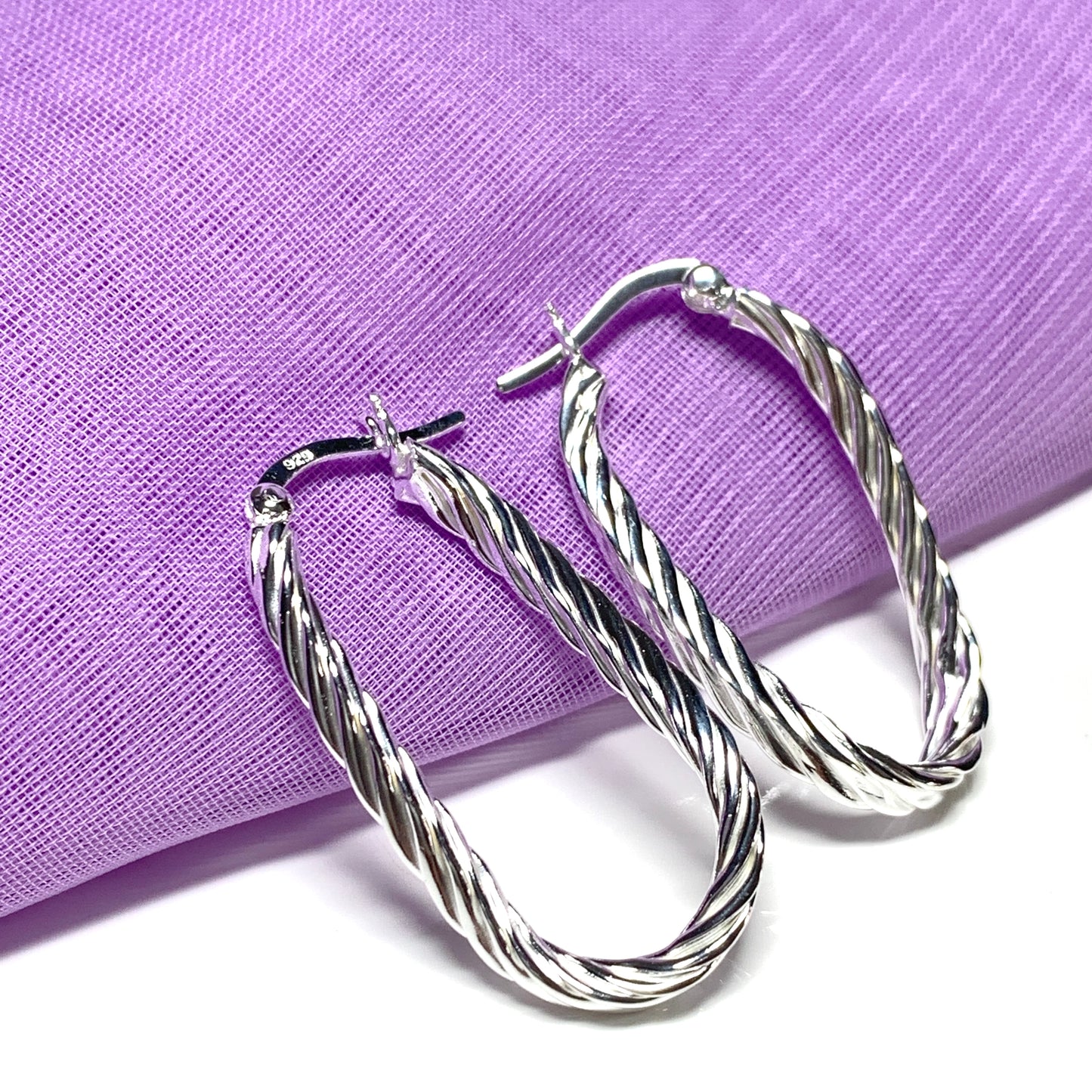 Oval patterned hoop earrings sterling silver