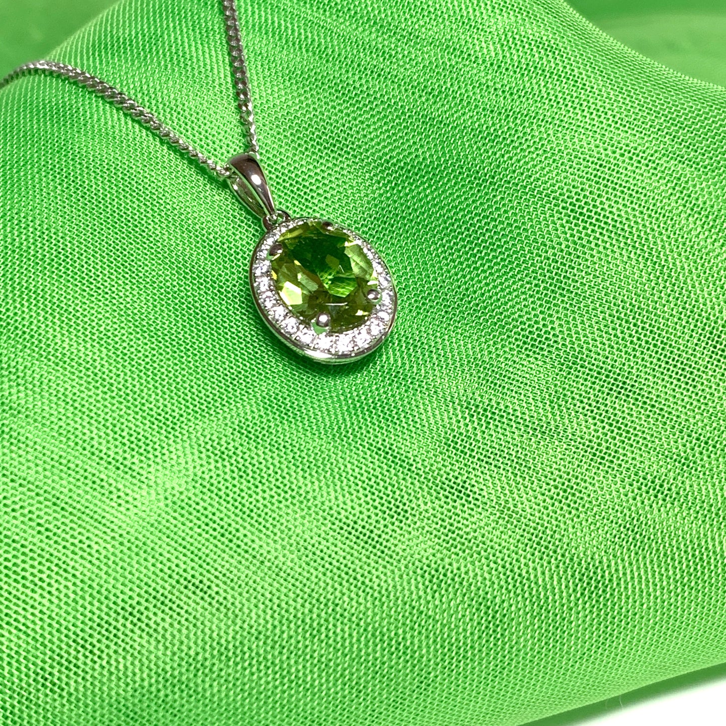 Oval peridot and cubic zirconia necklace